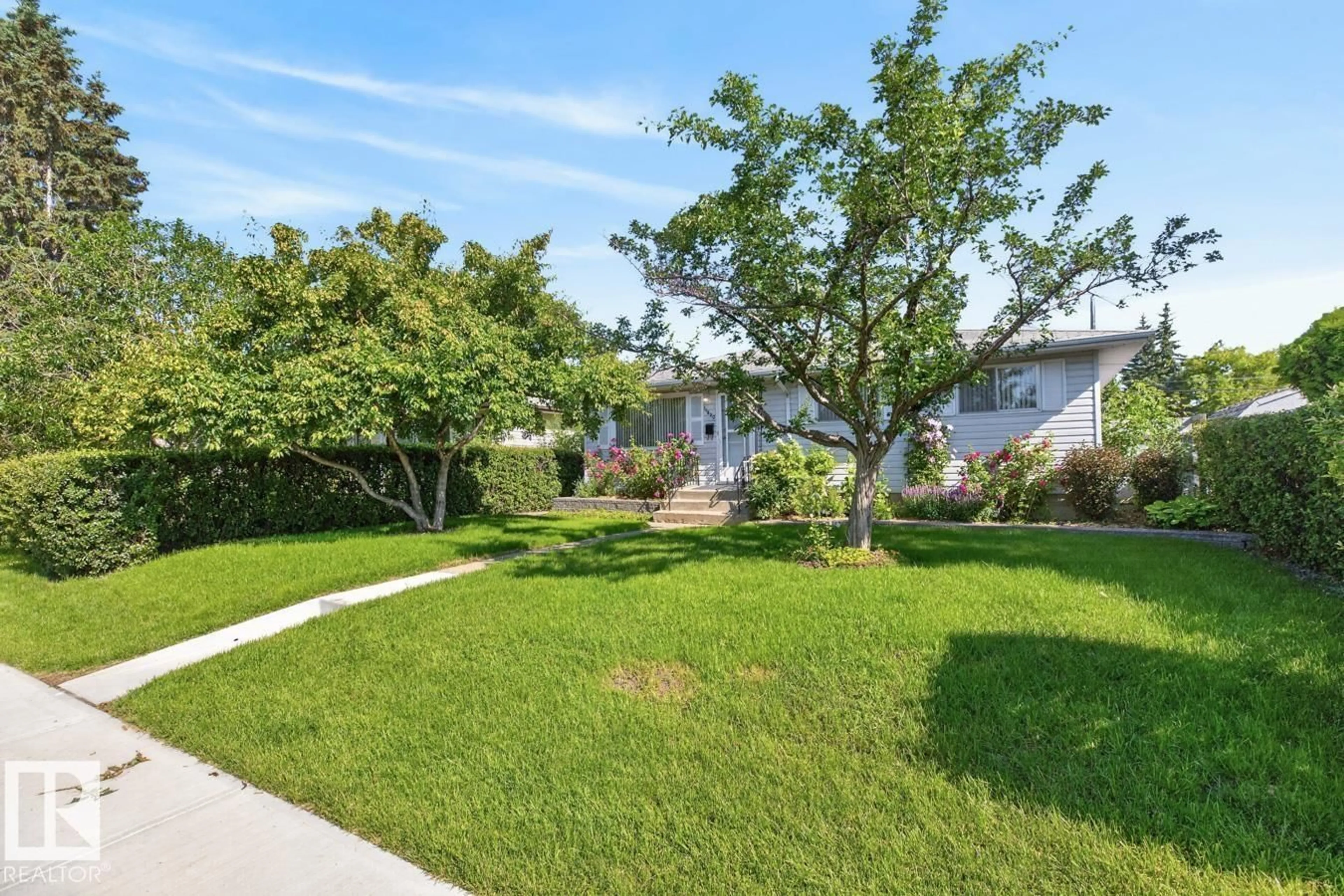 A pic from outside/outdoor area/front of a property/back of a property/a pic from drone, street for 11820 132 AV, Edmonton Alberta T5E1A7