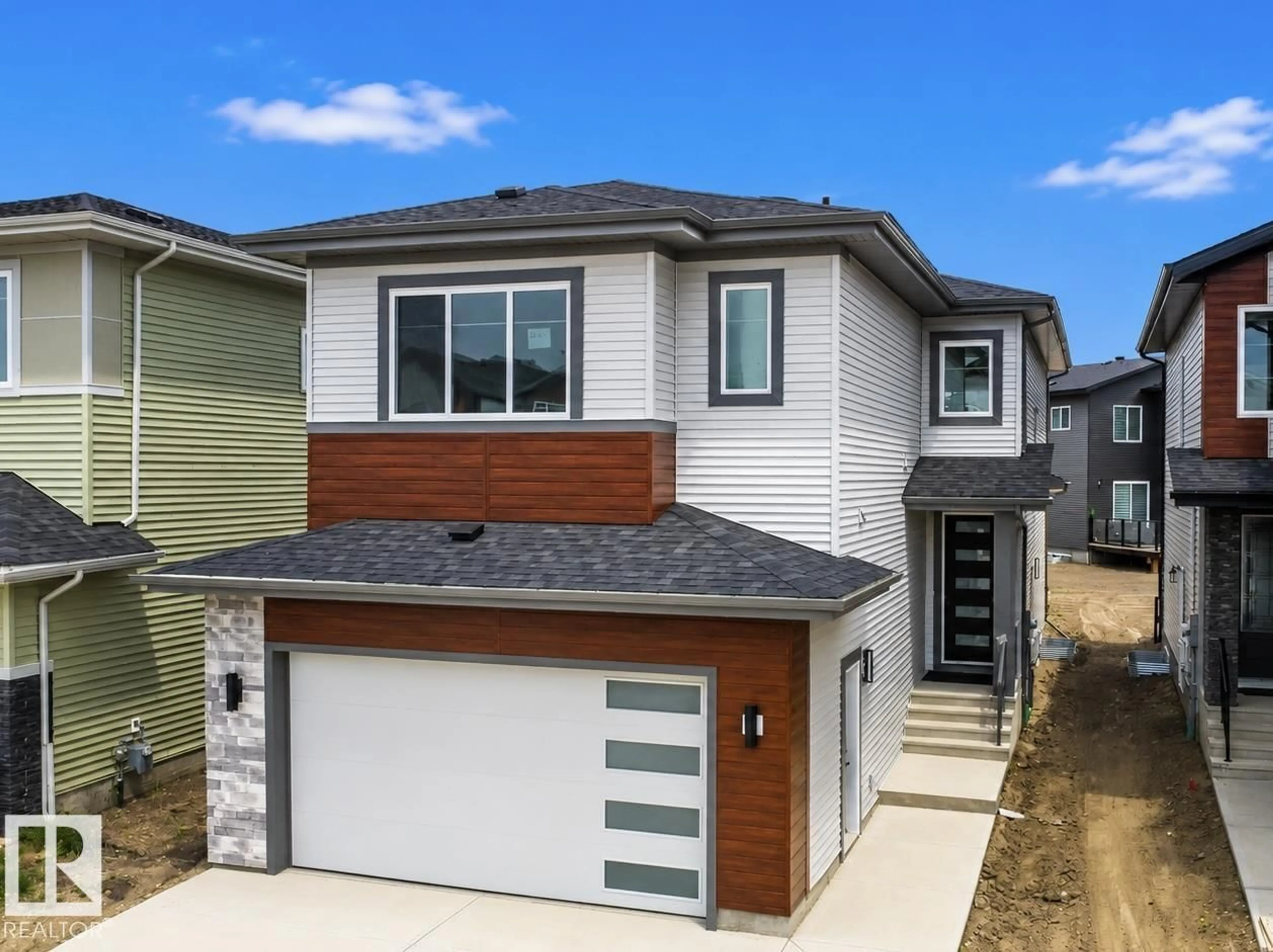 Home with vinyl exterior material, street for 8916 MAYDAY WY, Edmonton Alberta T6X3E9