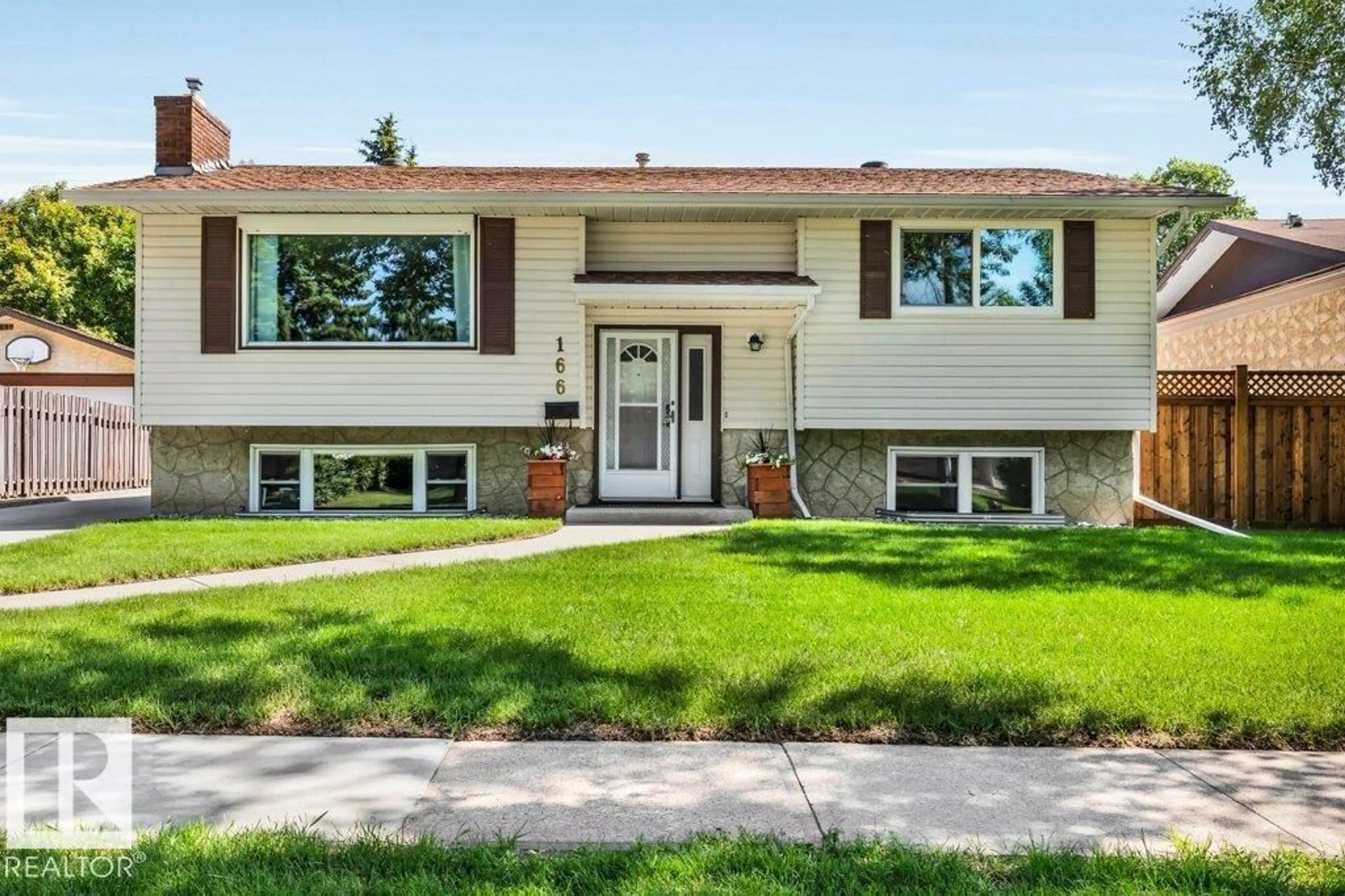 Home with vinyl exterior material, street for 166 LAROSE DR, St. Albert Alberta T8N2G8