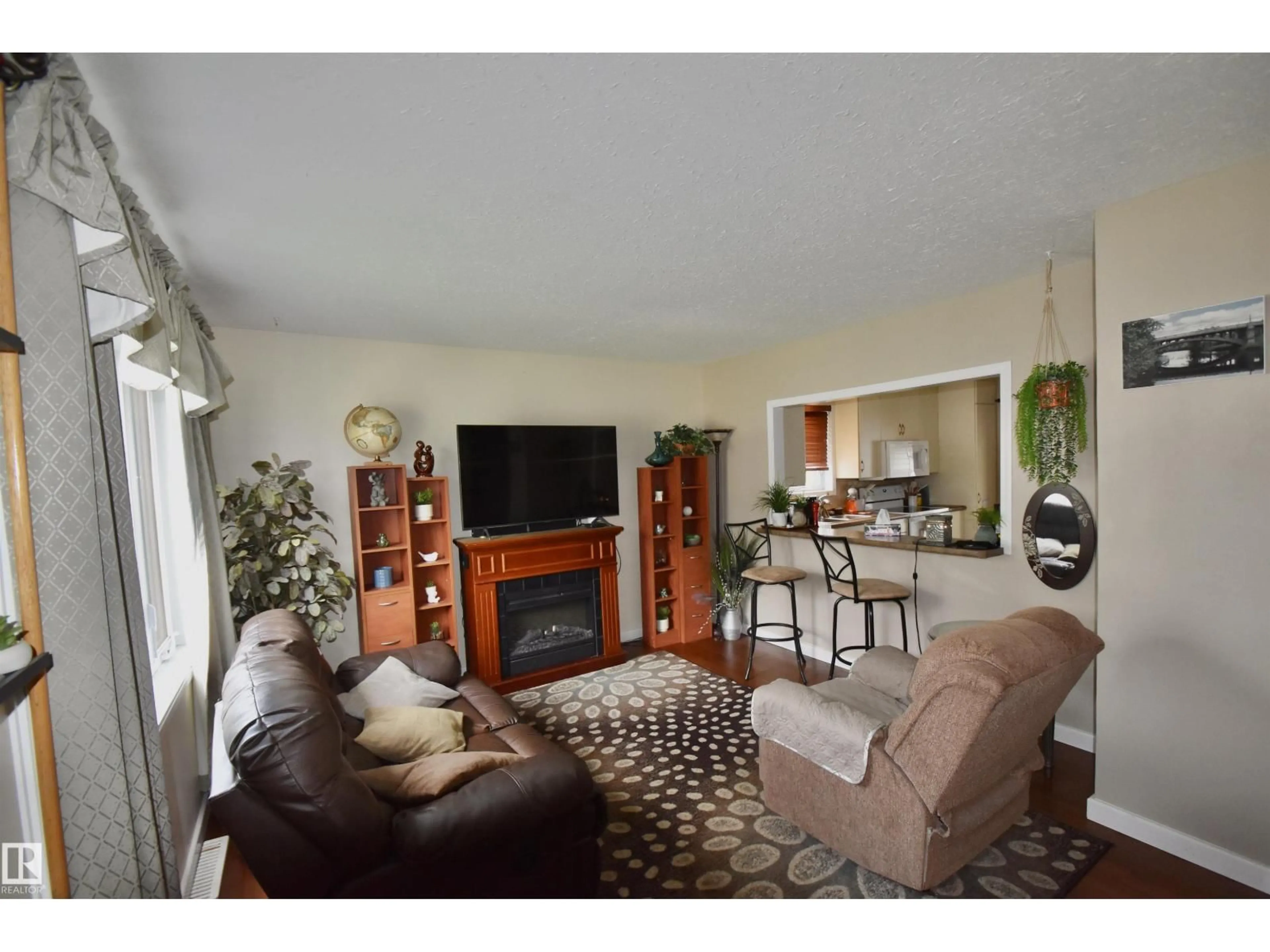 Living room with furniture, unknown for 4629 47 AV, St. Paul Town Alberta T0A3A3