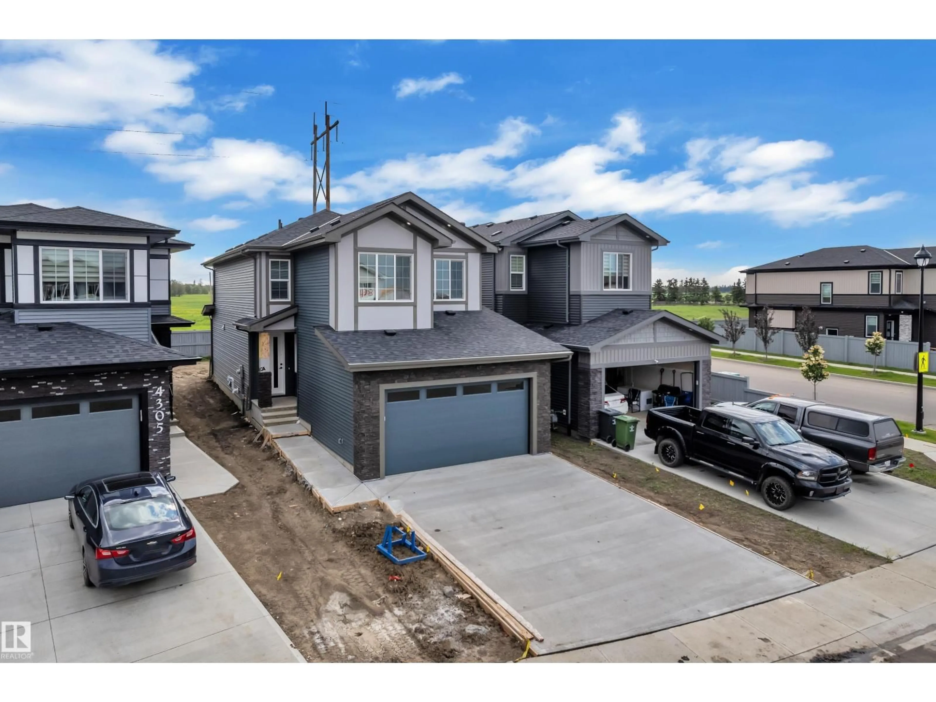 A pic from outside/outdoor area/front of a property/back of a property/a pic from drone, street for 4303 35 ST, Beaumont Alberta T4X3G6