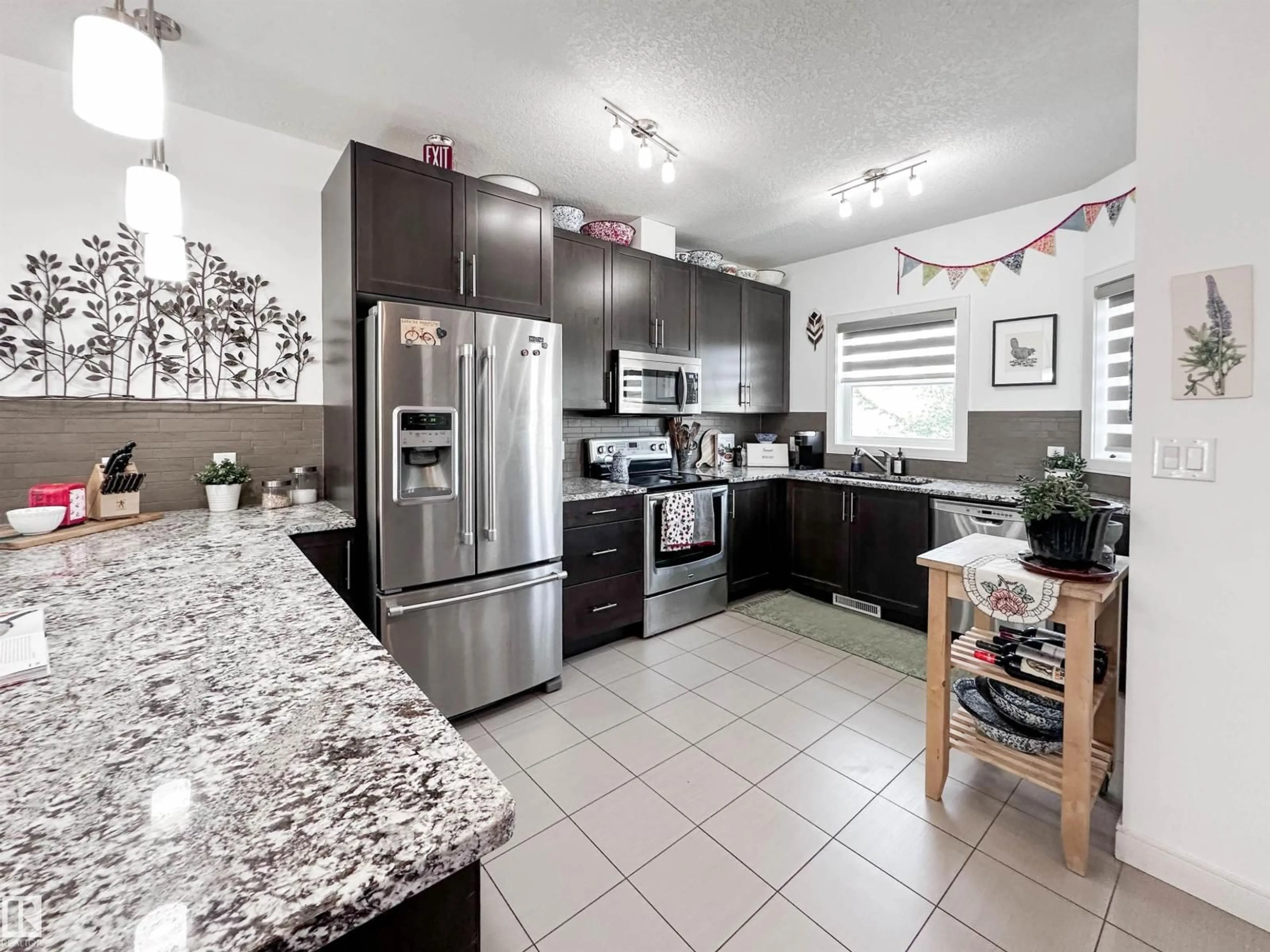 Open concept kitchen, ceramic/tile floor for #11 - 150 EVERITT DR, St. Albert Alberta T8N7R8