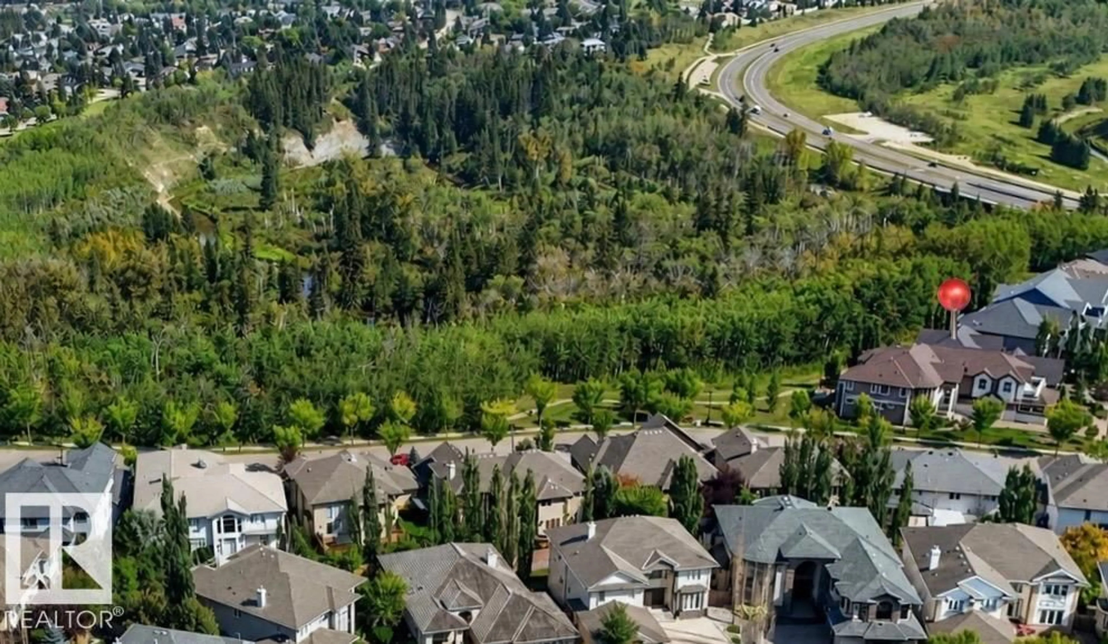 A pic from outside/outdoor area/front of a property/back of a property/a pic from drone, mountain view for 1004 HOLLANDS PT, Edmonton Alberta T6R3T1