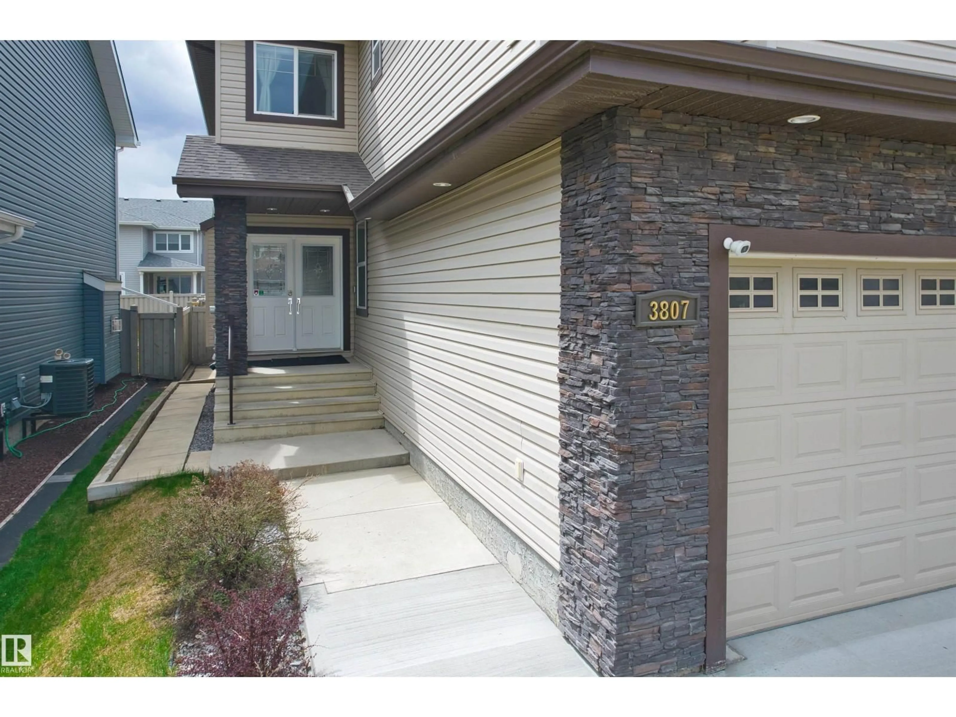 Home with vinyl exterior material, street for 3807 CLAXTON CL, Edmonton Alberta T6W1Y5
