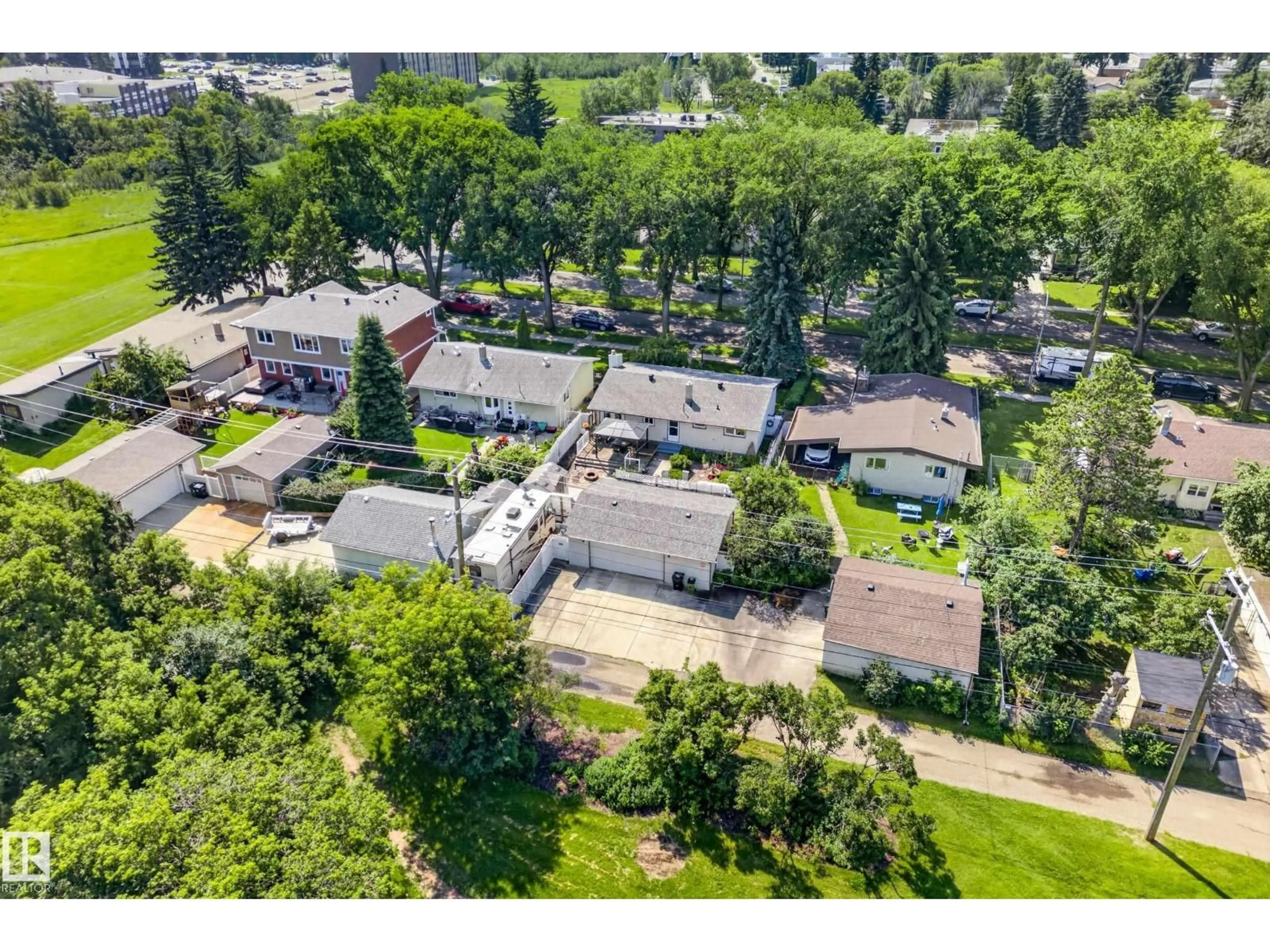 A pic from outside/outdoor area/front of a property/back of a property/a pic from drone, street for 6716 101A AV NW, Edmonton Alberta T6A0M2