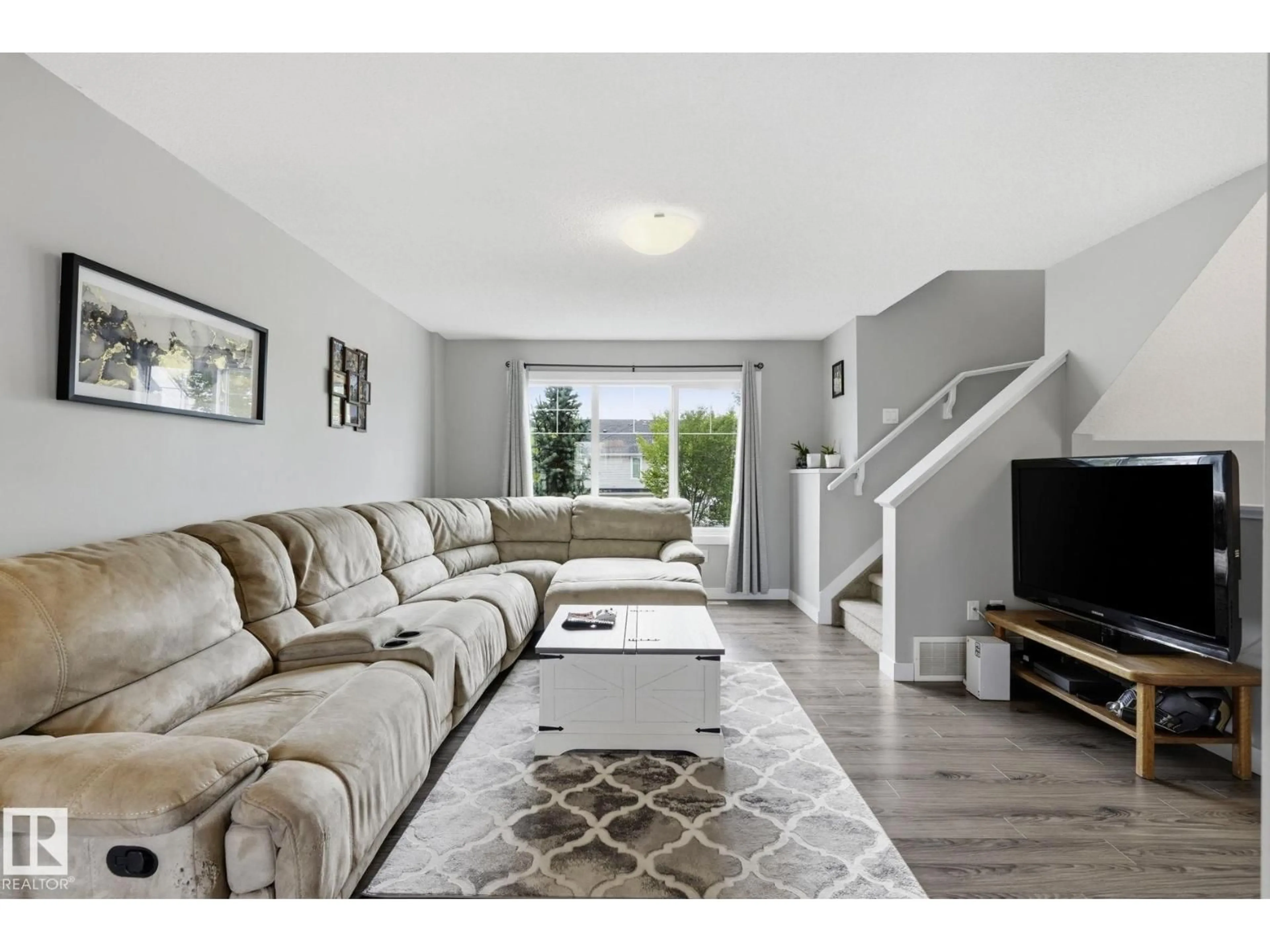 Living room with furniture, unknown for #12 - 1391 STARLING DR, Edmonton Alberta T5V1T7