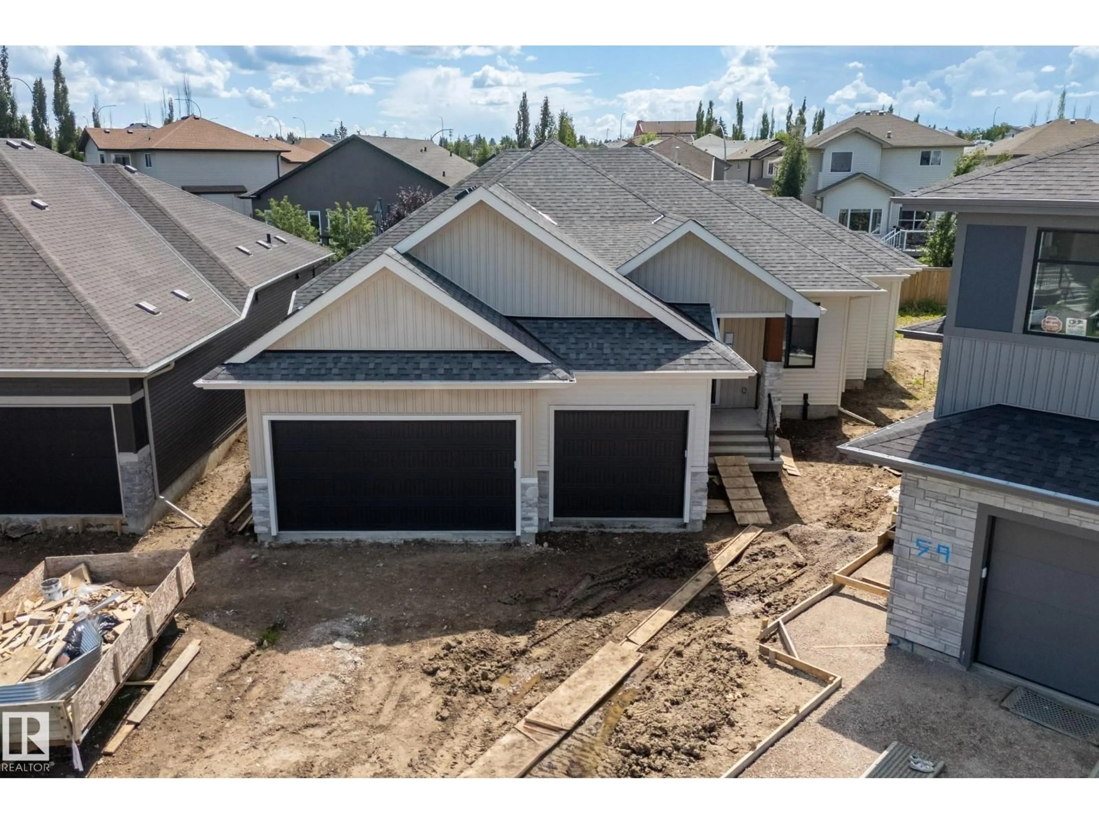 A pic from outside/outdoor area/front of a property/back of a property/a pic from drone, street for 57 HULL WD, Spruce Grove Alberta T7X0X5