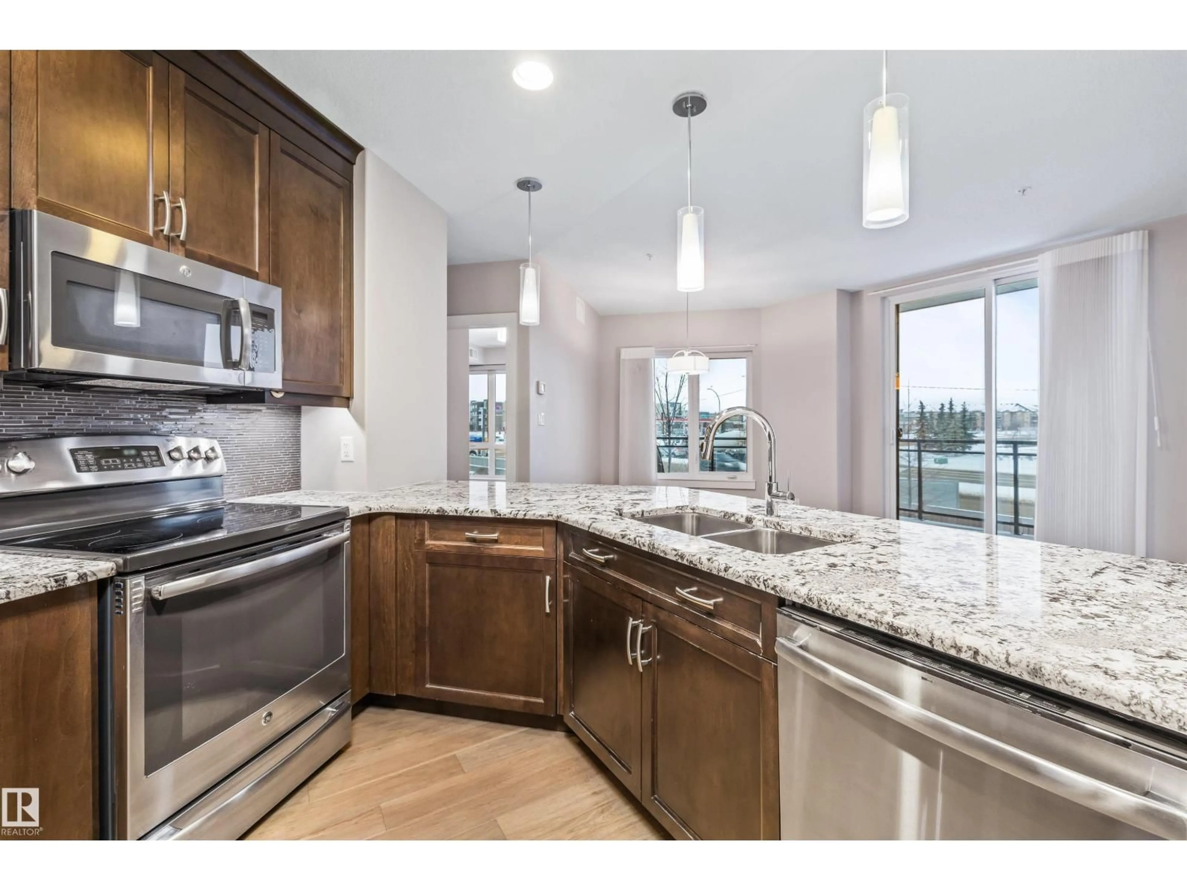 Open concept kitchen, unknown for #211 - 11080 ELLERSLIE RD SW, Edmonton Alberta T6W2C2