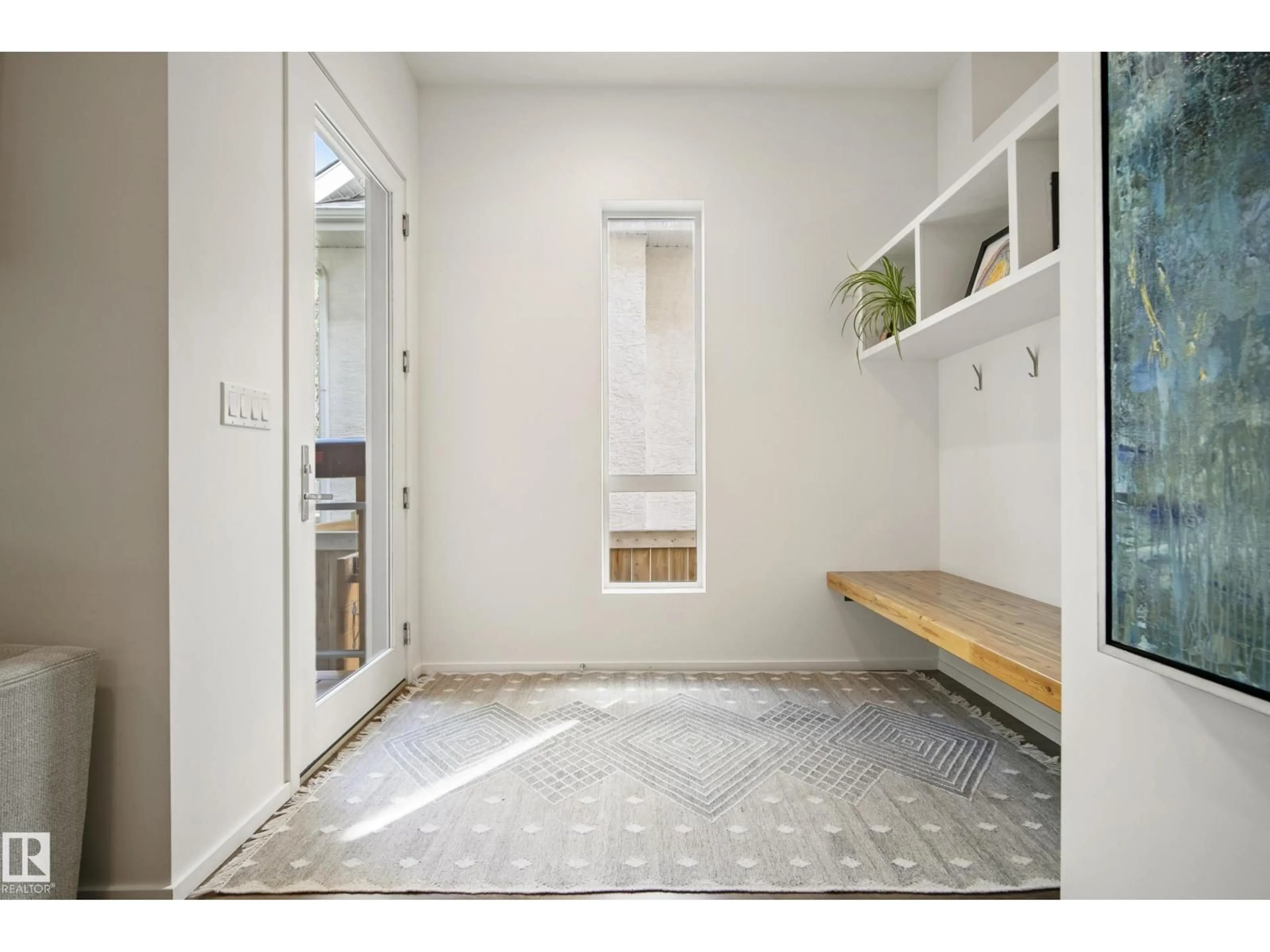 Indoor entryway for 8751 83 AV, Edmonton Alberta T6C1B2
