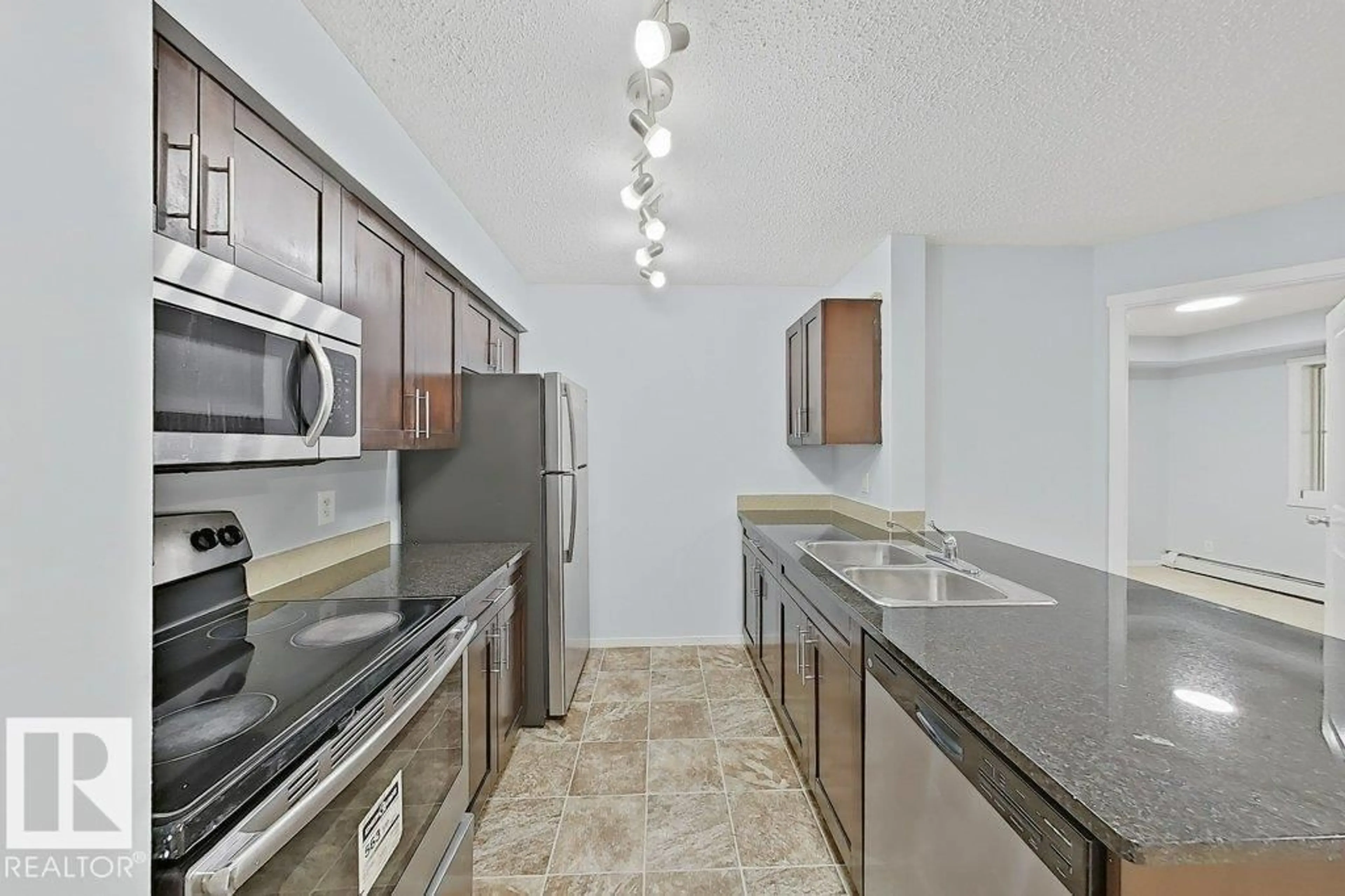 Standard kitchen, unknown for #215 - 3211 JAMES MOWATT TR, Edmonton Alberta T6W3L6