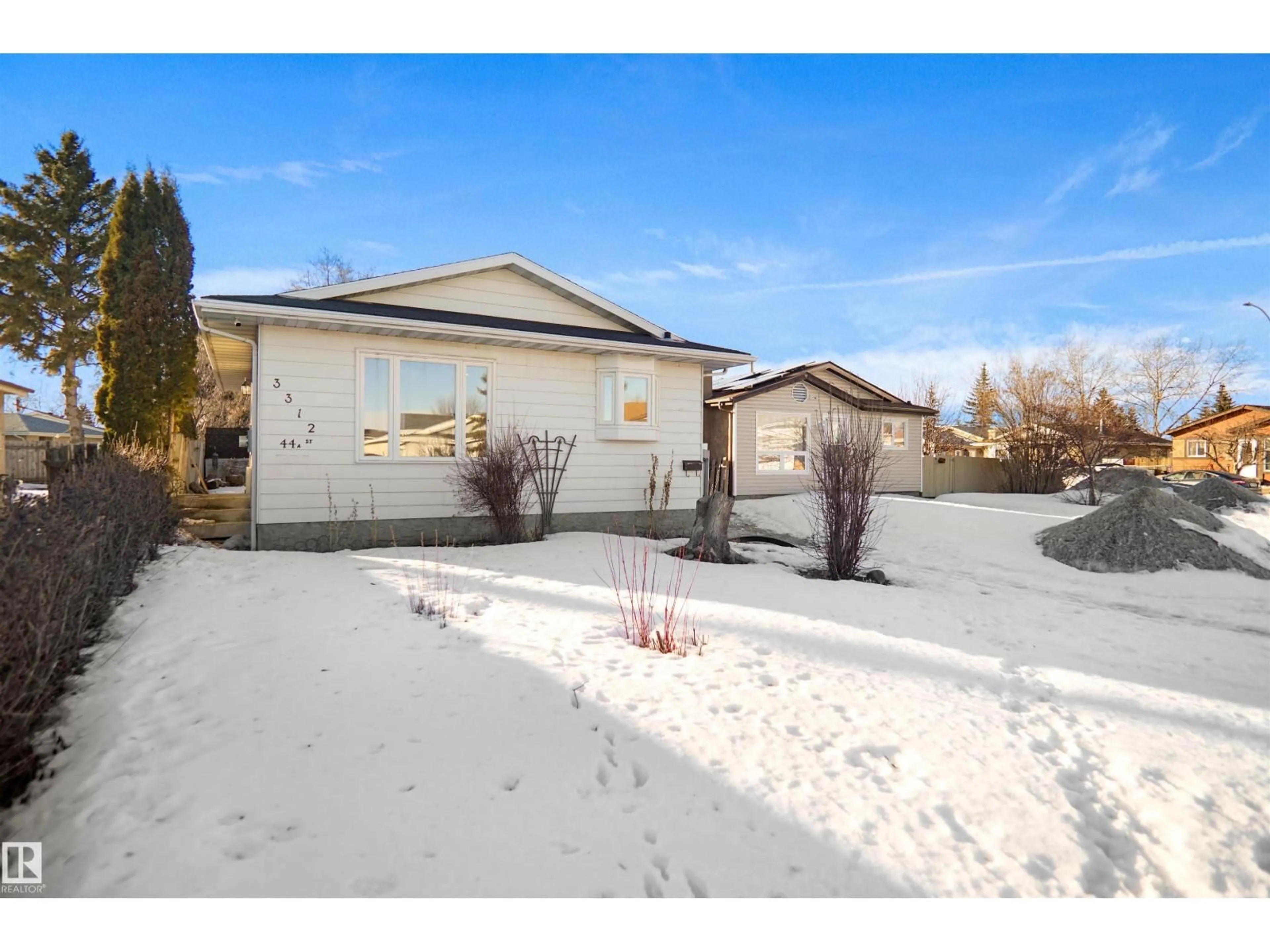 Home with vinyl exterior material, street for NW - 3312 44A ST, Edmonton Alberta T6L4W9
