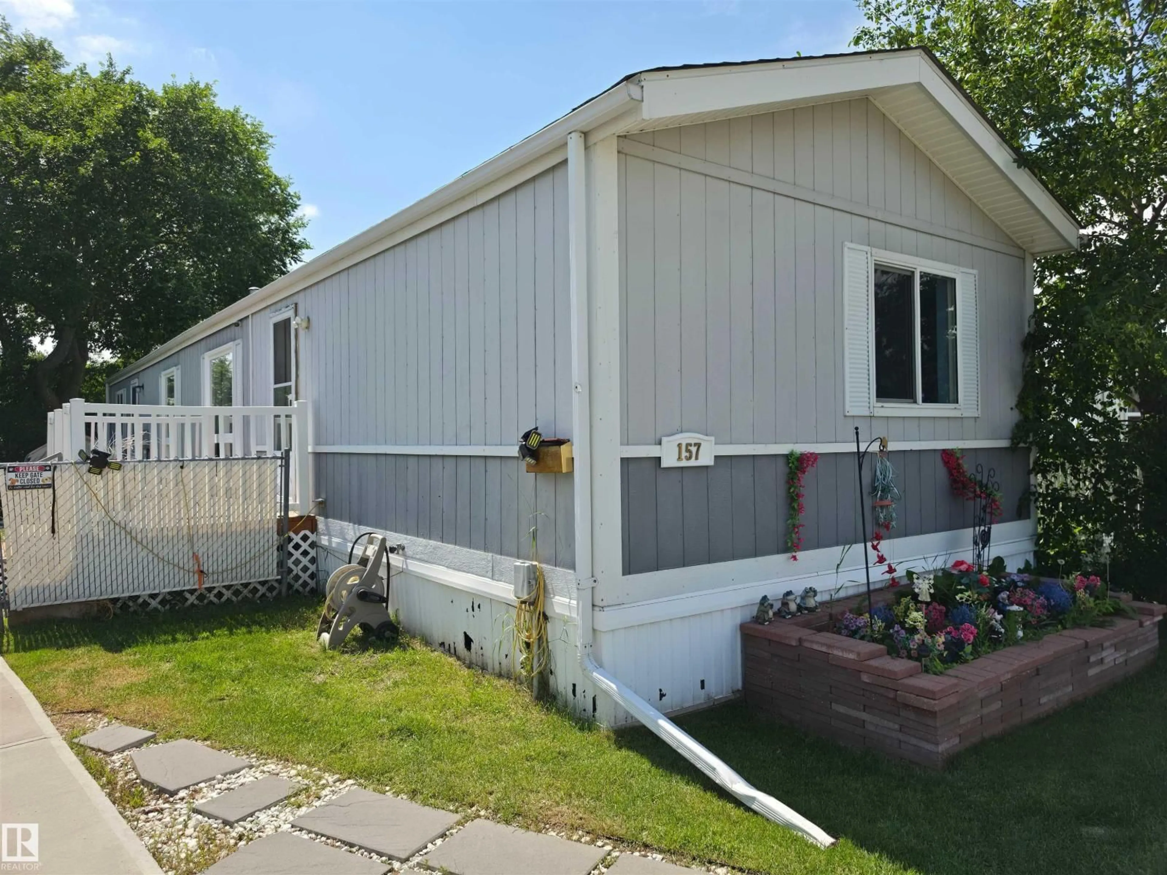 Home with vinyl exterior material, street for 157 LEE RIDGE RD, Edmonton Alberta T6K0N1