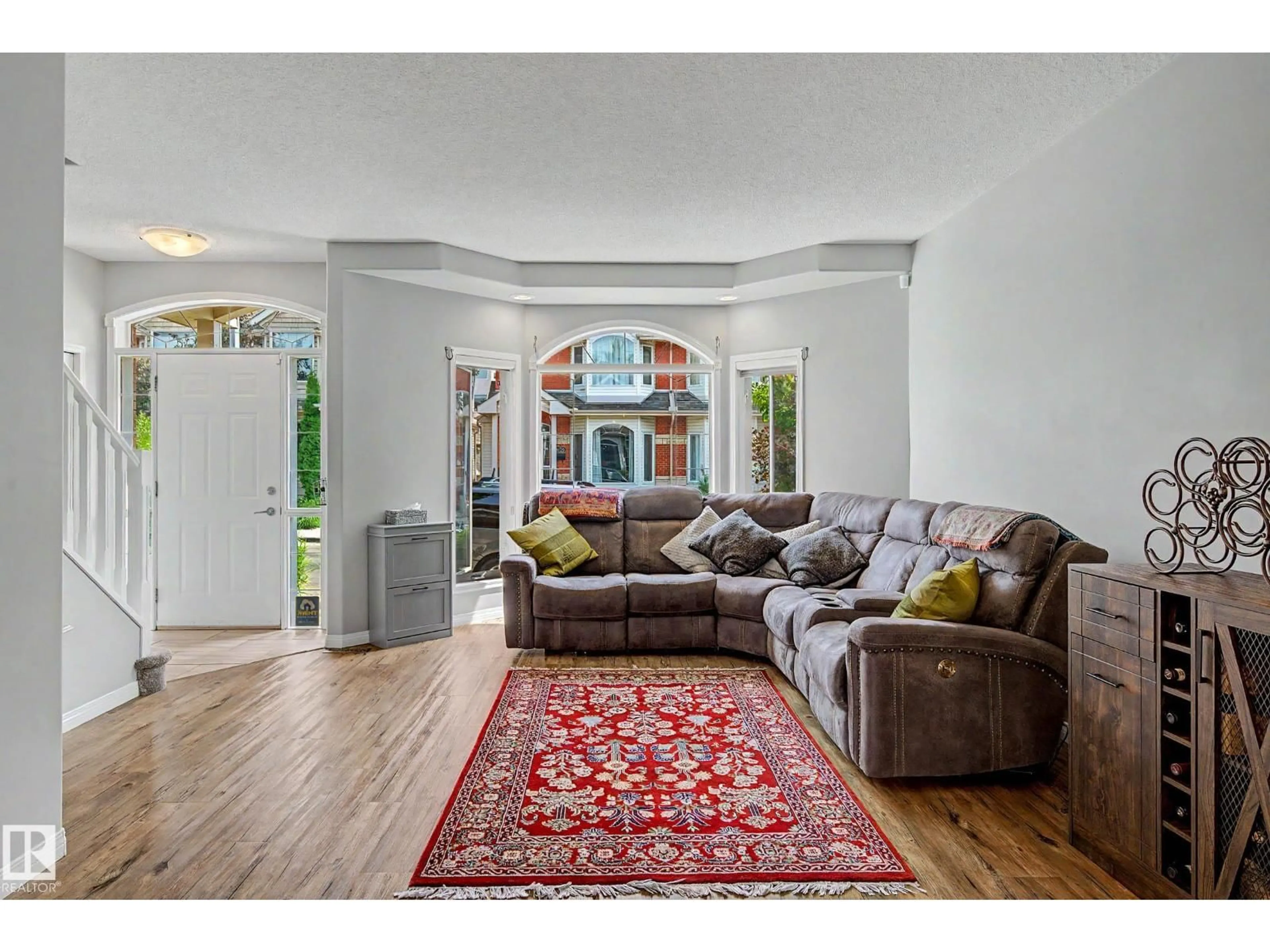 Living room with furniture, unknown for 9130 100A AV, Edmonton Alberta T5H4N7