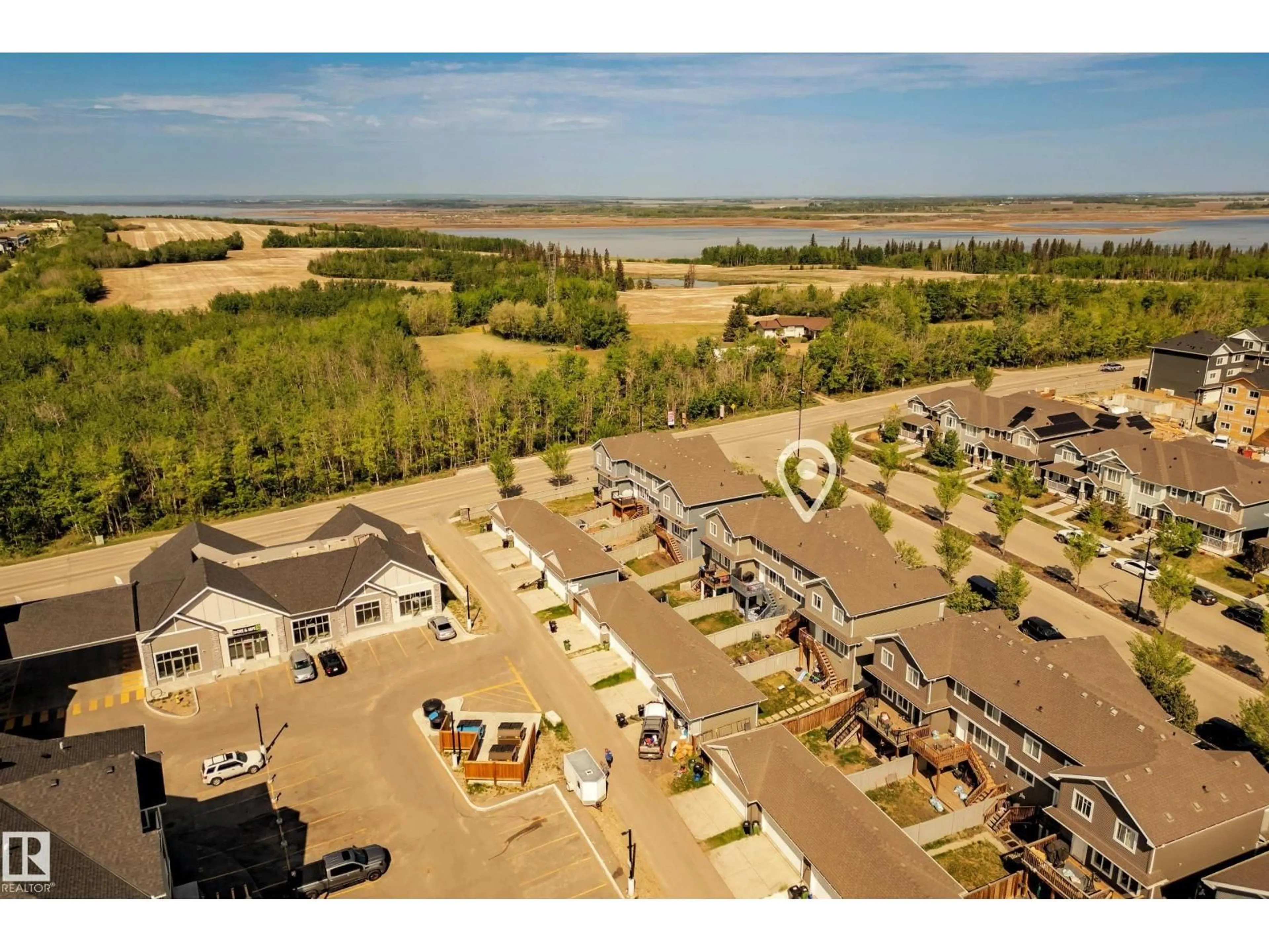 A pic from outside/outdoor area/front of a property/back of a property/a pic from drone, water/lake/river/ocean view for 4013 BLACKBIRD LI, Edmonton Alberta T5S0K8