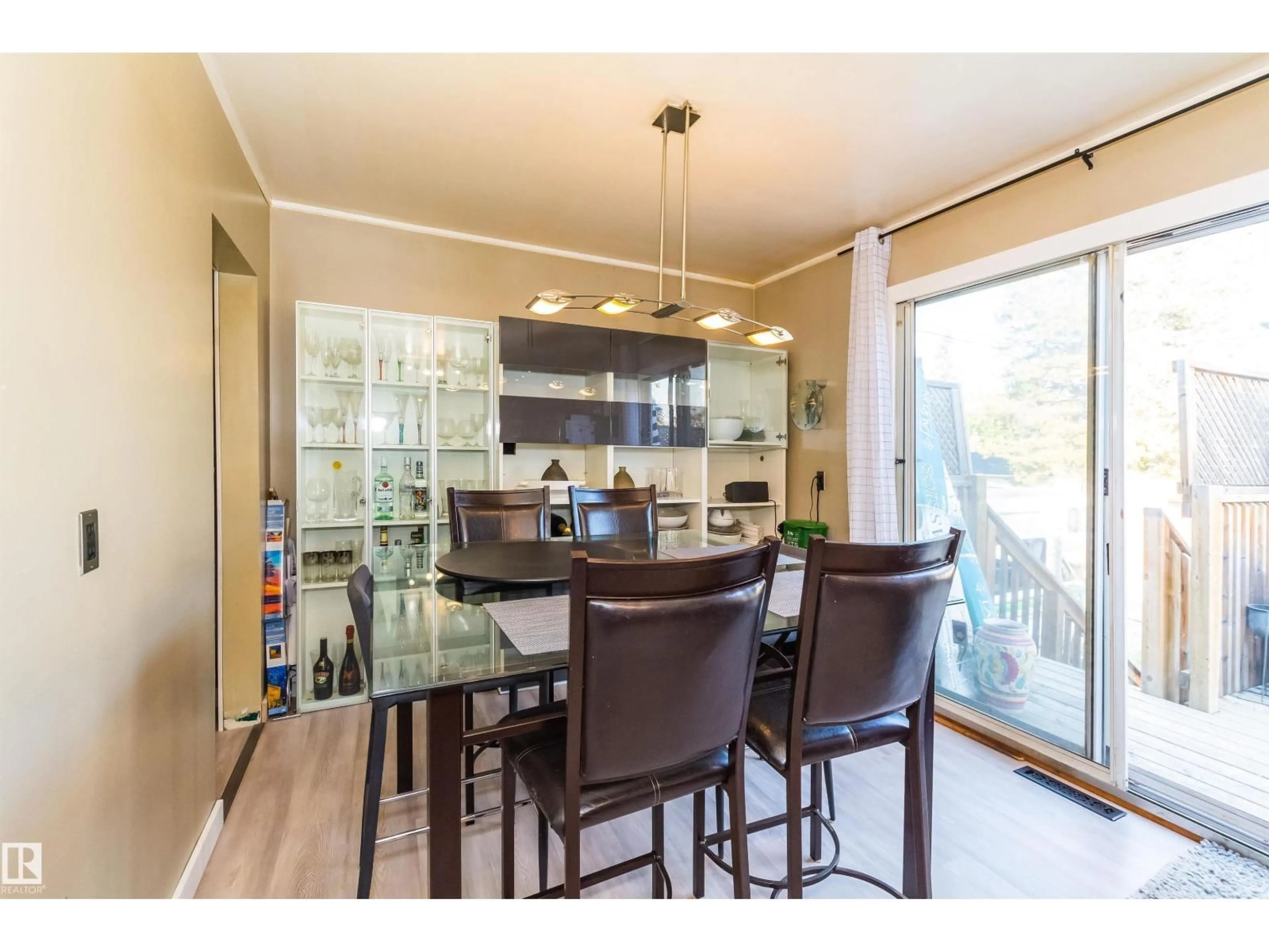 Dining room, wood/laminate floor for NW - 13208 128 AV, Edmonton Alberta T5L3H2
