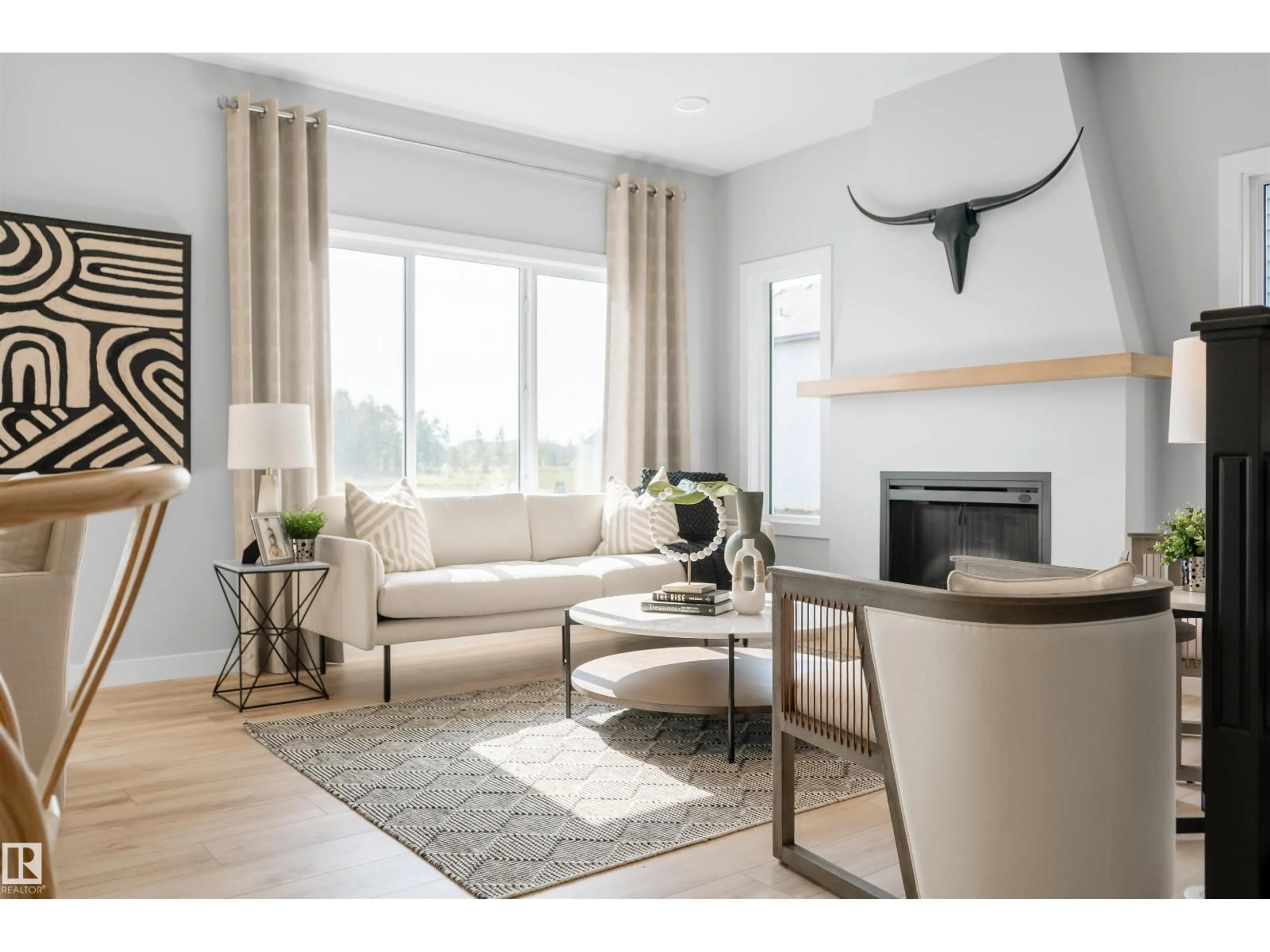 Living room with furniture, wood/laminate floor for 3243 DIXON WY, Edmonton Alberta T6W5K9
