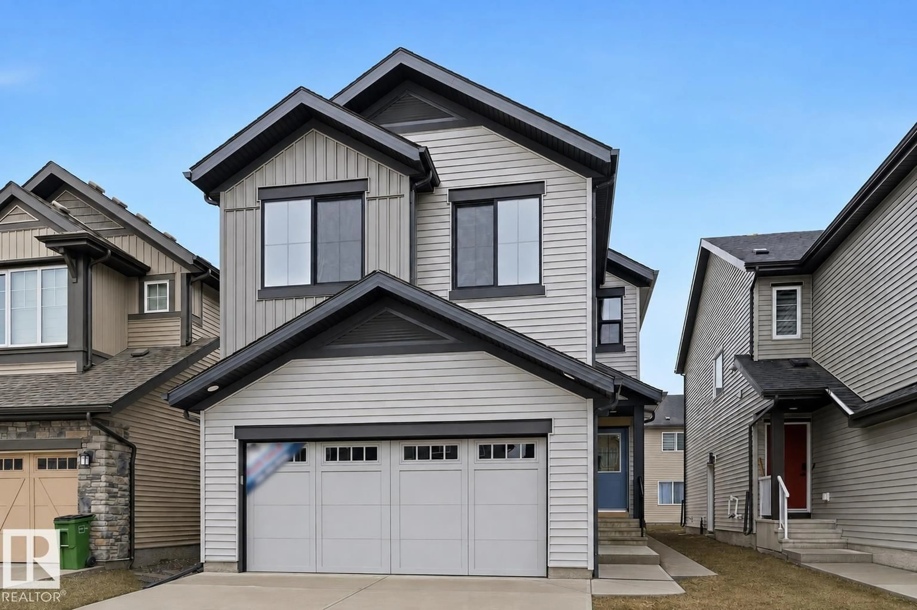 Home with vinyl exterior material, street for 3212 DIXON WY, Edmonton Alberta T6W5L3
