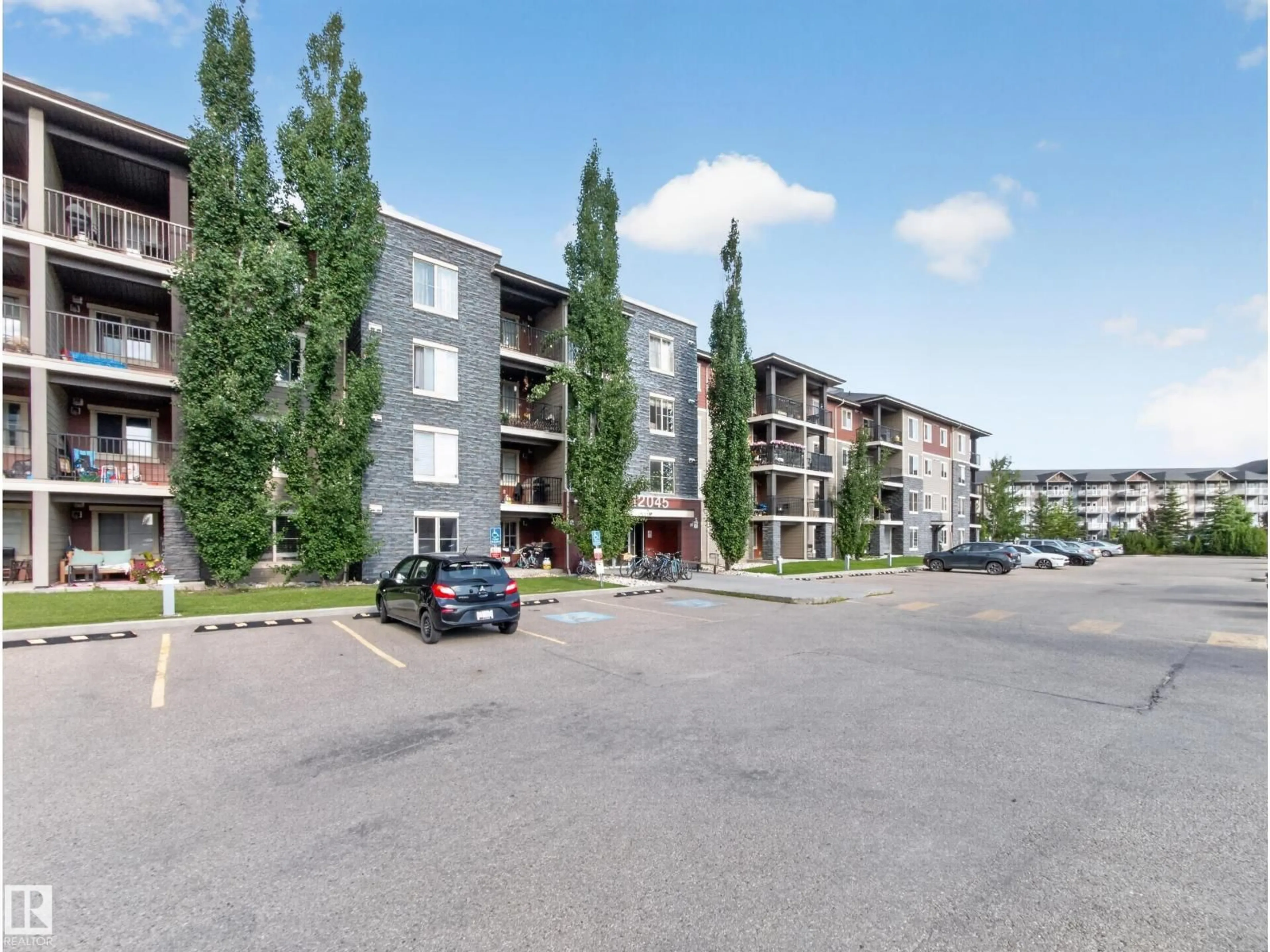 A pic from outside/outdoor area/front of a property/back of a property/a pic from drone, street for #217 - 12045 22 AV, Edmonton Alberta T6W2Y2