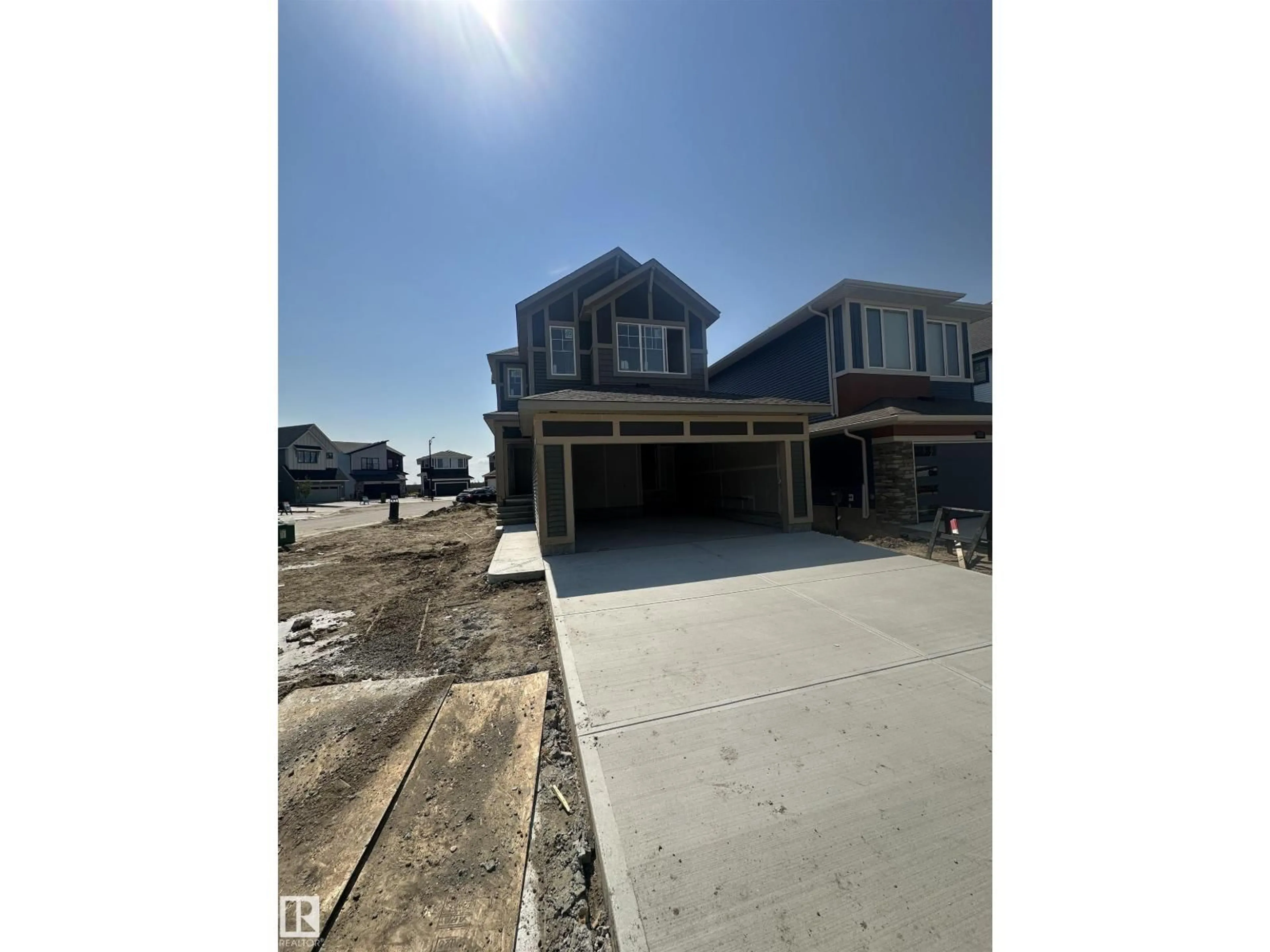 A pic from outside/outdoor area/front of a property/back of a property/a pic from drone, street for 2357 MUCKLEPLUM WY, Edmonton Alberta T6X3J9