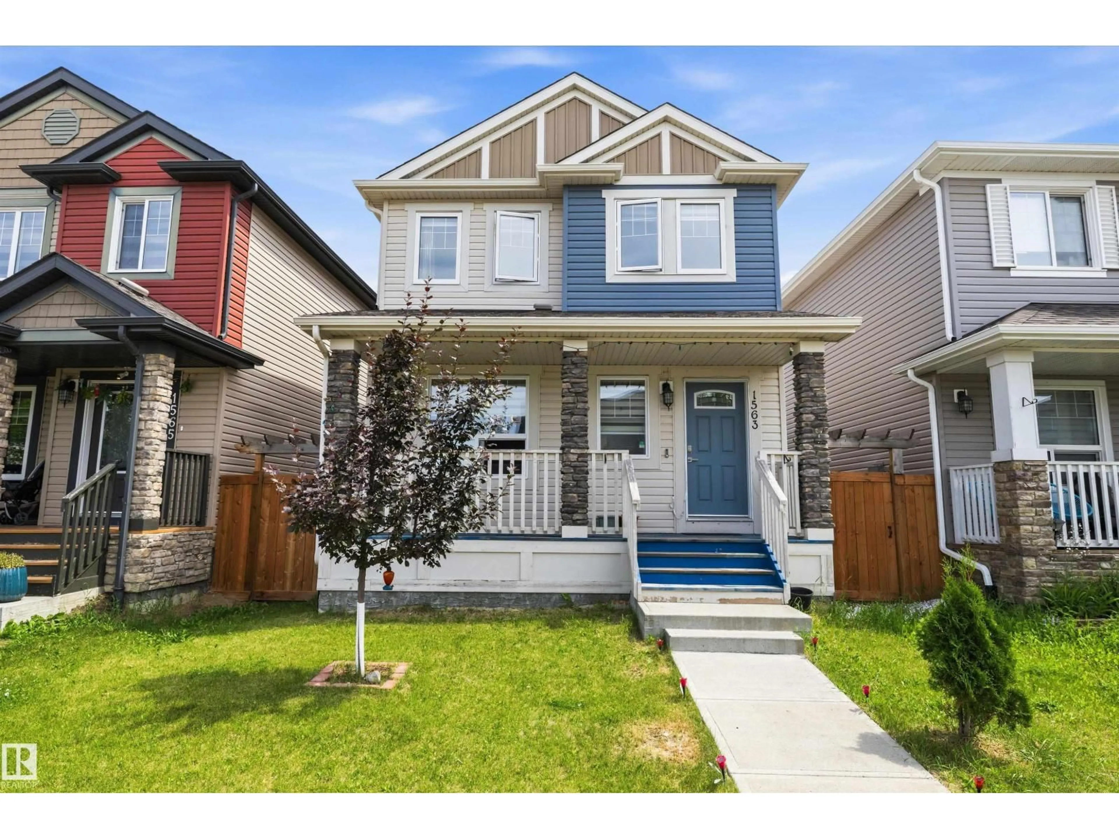 Home with vinyl exterior material, street for 1563 TAMARACK BV, Edmonton Alberta T6T2E2