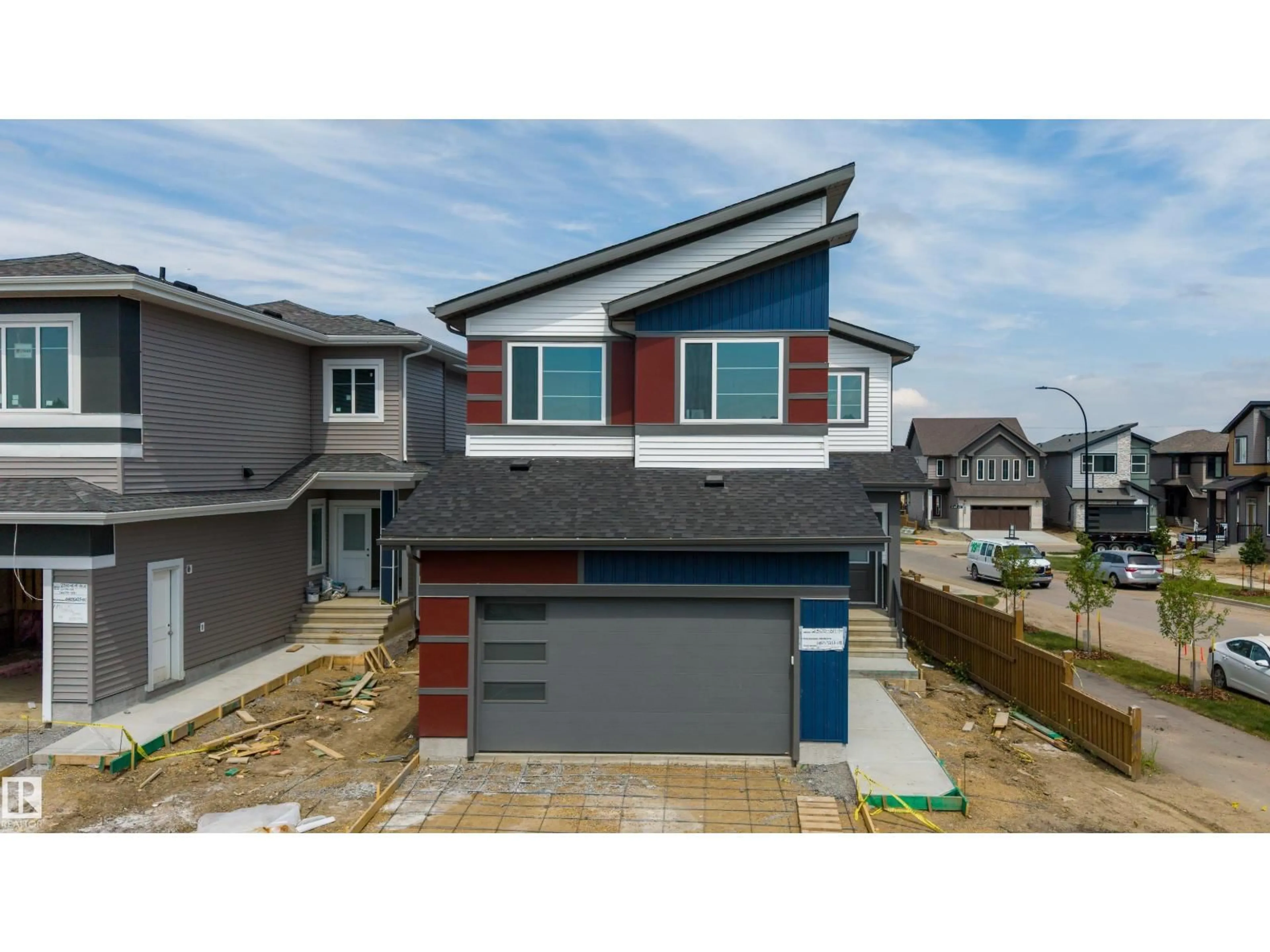 Home with vinyl exterior material, street for SW - 2306 6A AV, Edmonton Alberta T6X3M2