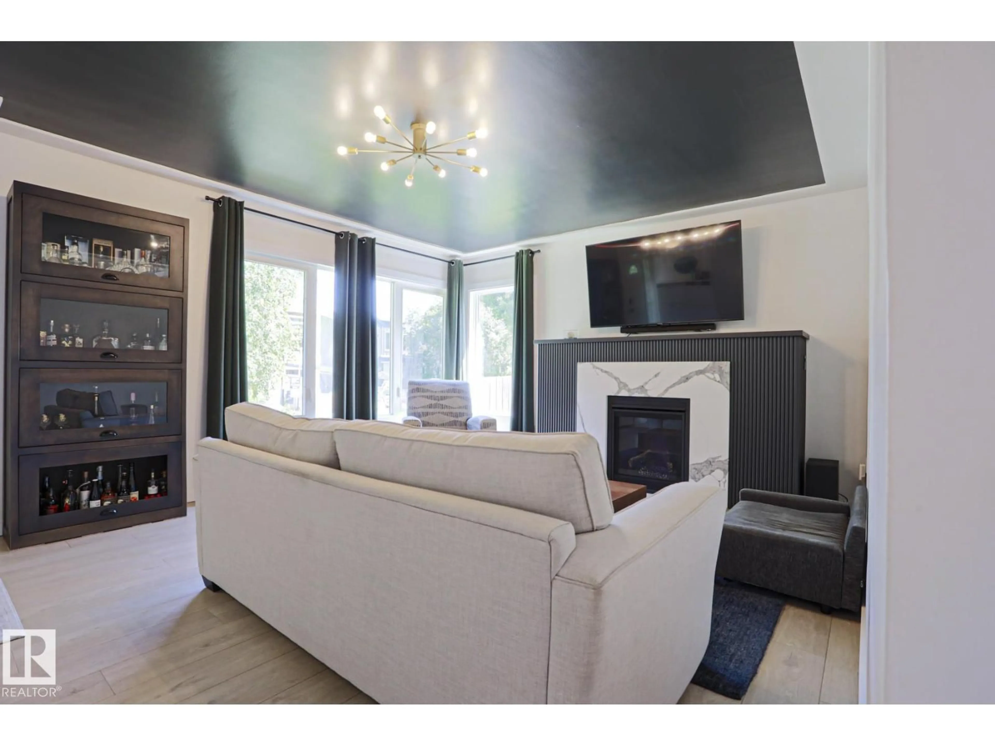 Living room with furniture, unknown for NW - 11142 51 ST, Edmonton Alberta T5W3E6