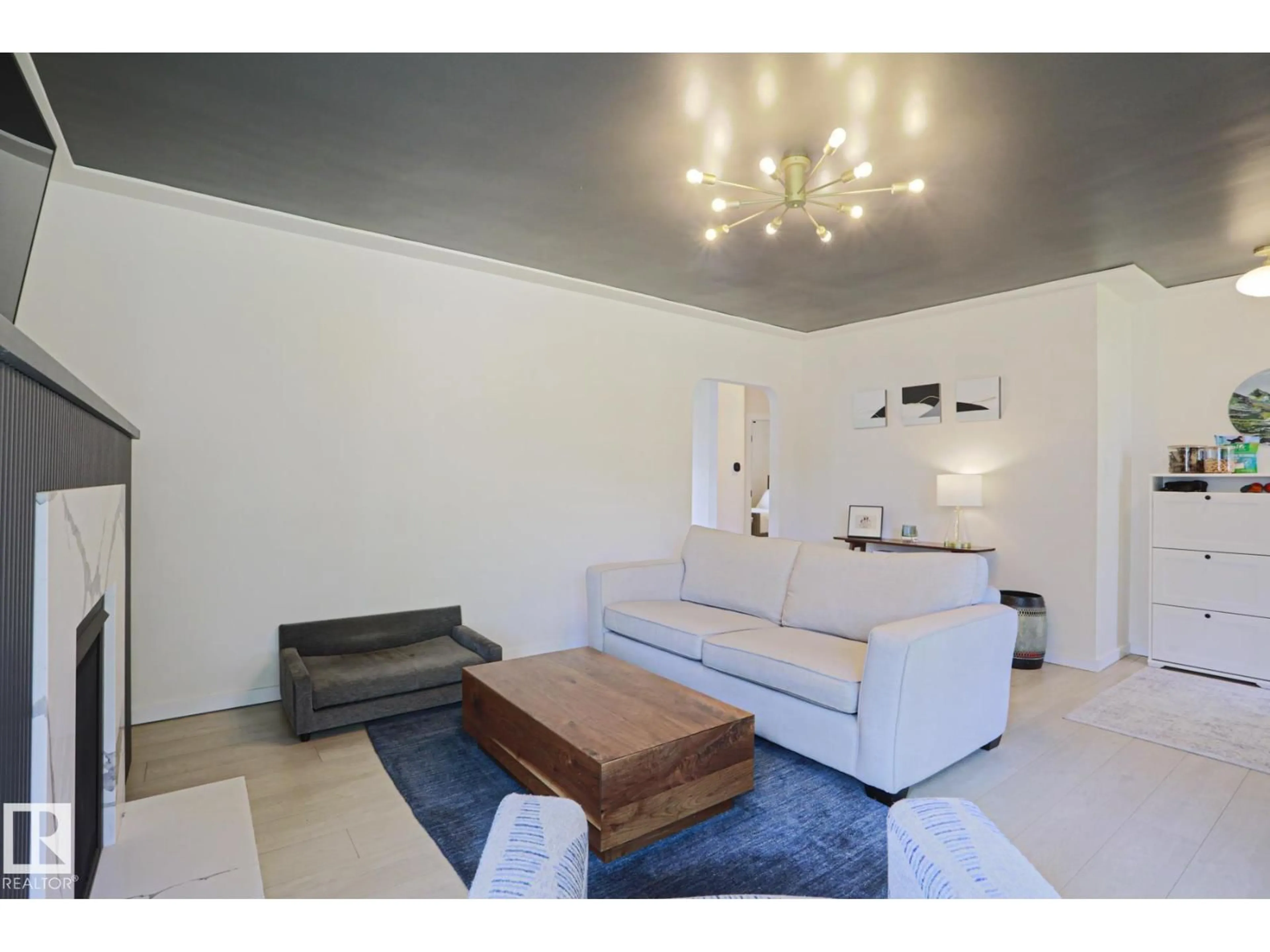 Living room with furniture, unknown for NW - 11142 51 ST, Edmonton Alberta T5W3E6