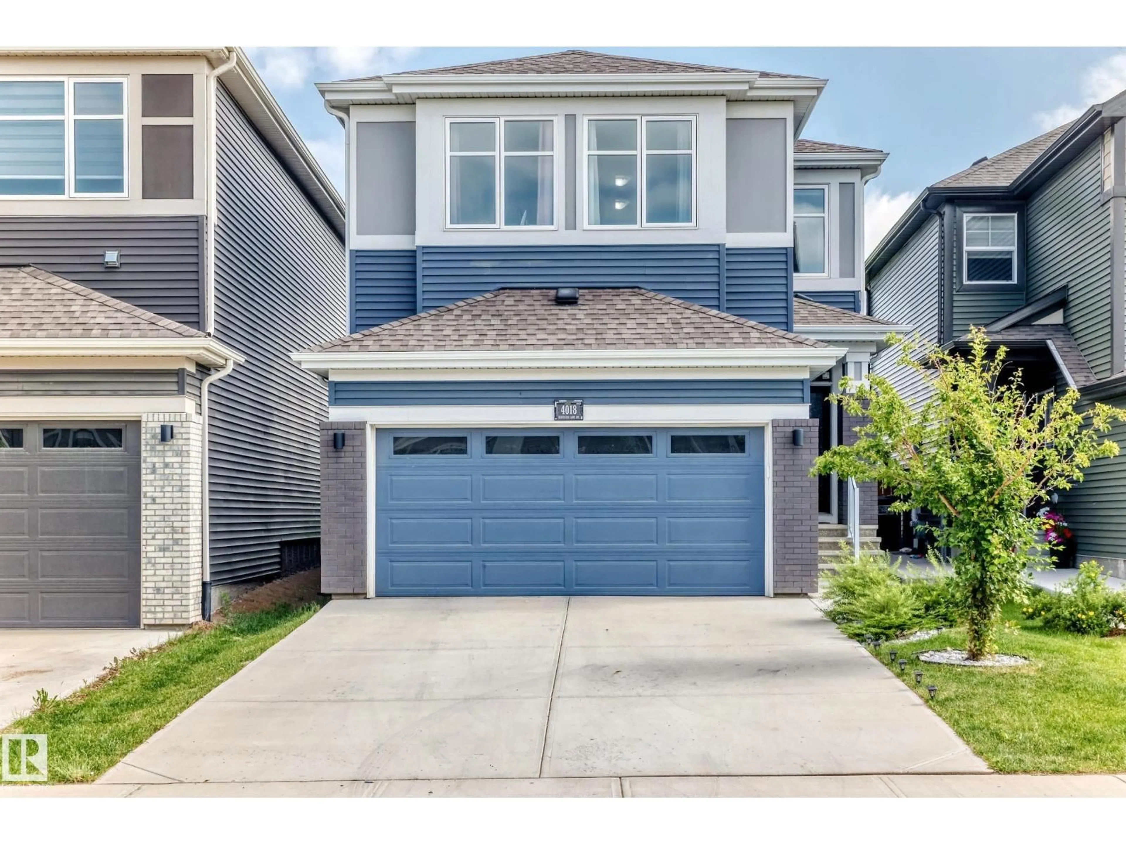 Home with vinyl exterior material, street for LI SW - 4018 HAWTHORN LINK, Edmonton Alberta T6X1Y6