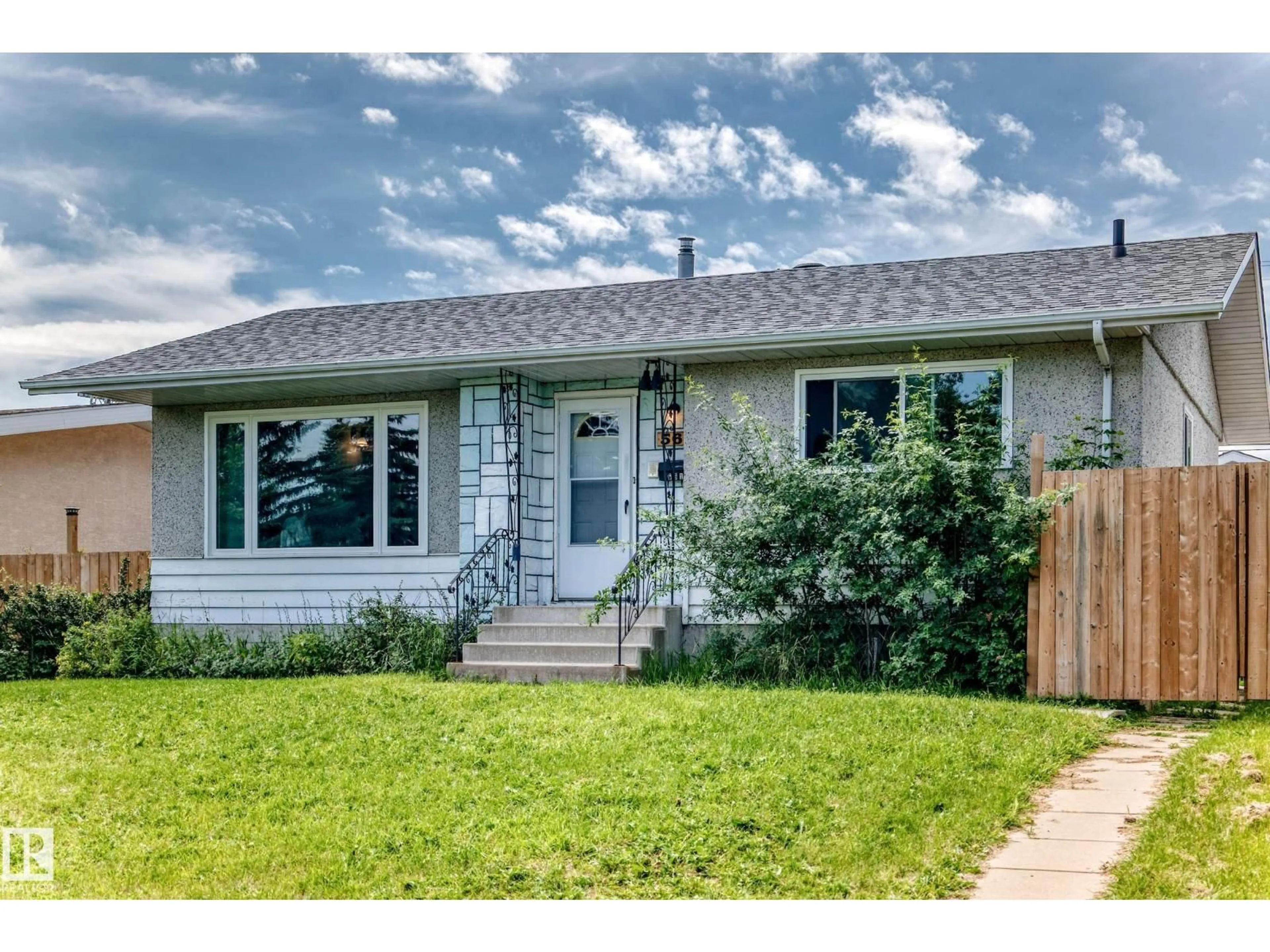 Home with vinyl exterior material, street for 5611 134A AV, Edmonton Alberta T5A0M3