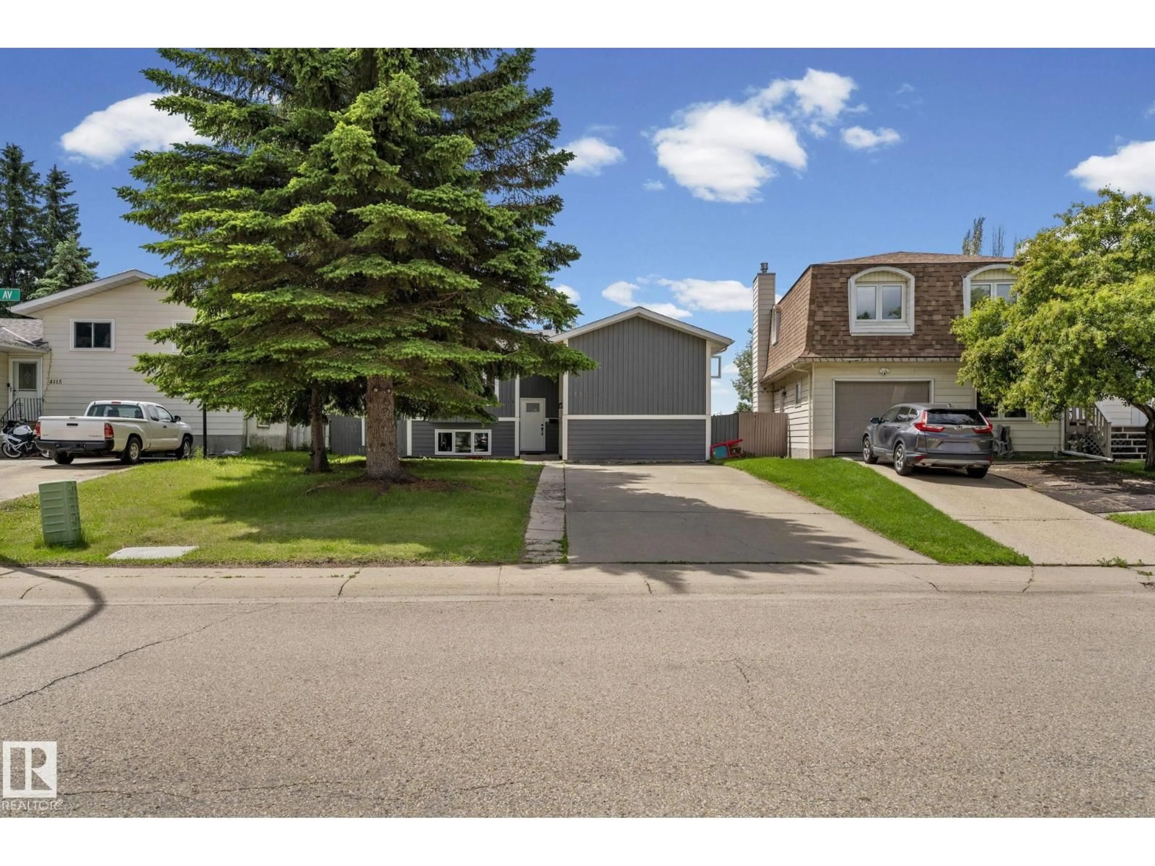 A pic from outside/outdoor area/front of a property/back of a property/a pic from drone, street for 4119 18 AV, Edmonton Alberta T6L3M3