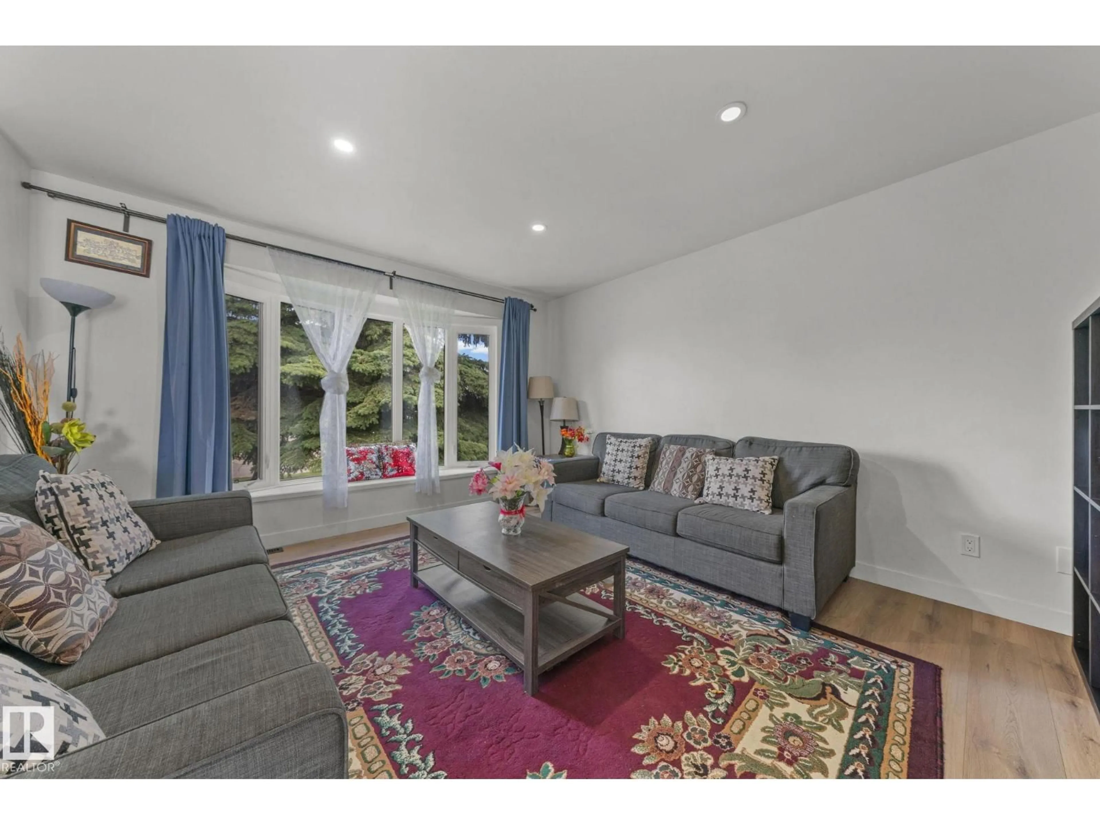 Living room with furniture, unknown for 4119 18 AV, Edmonton Alberta T6L3M3