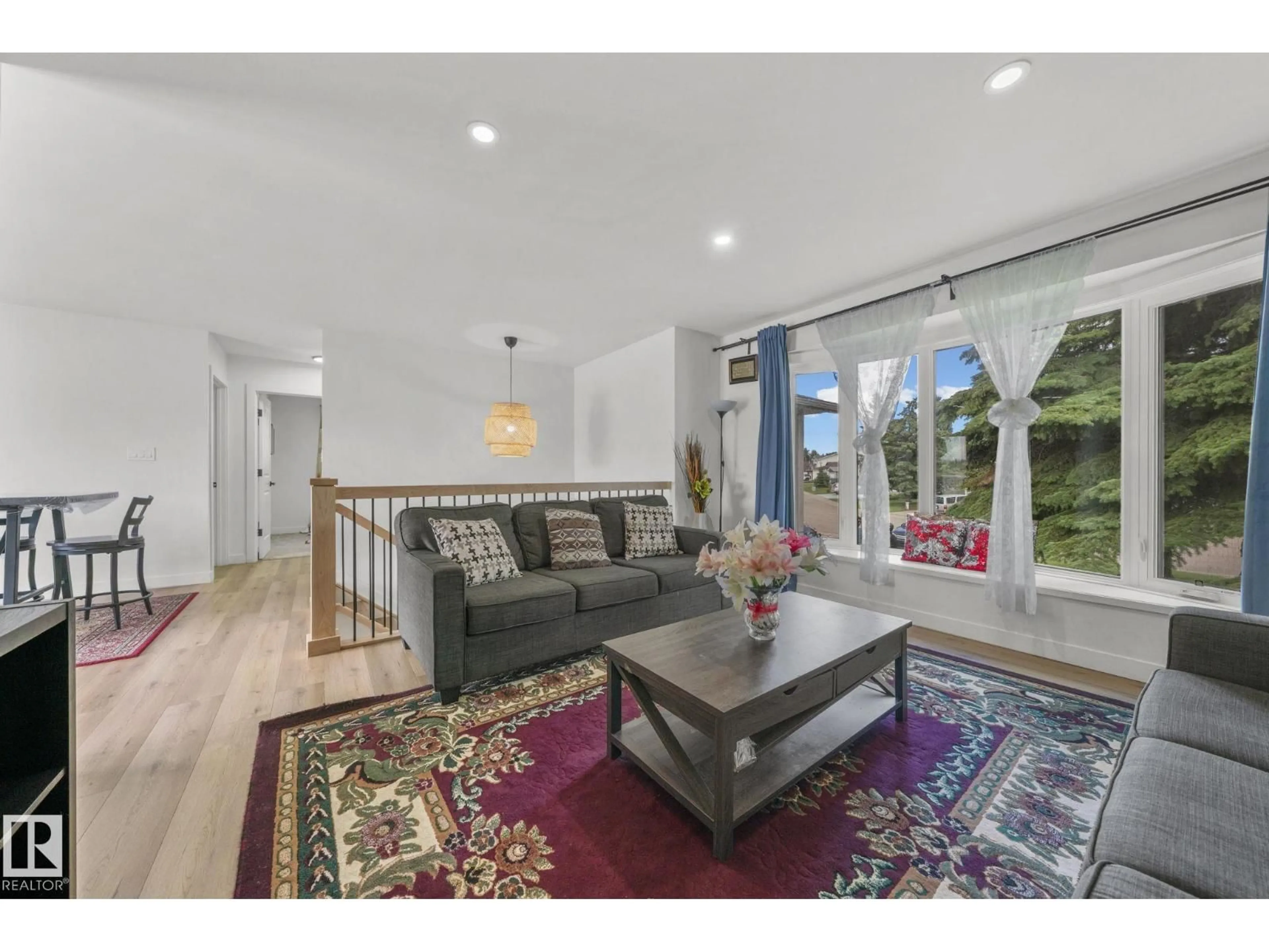 Living room with furniture, unknown for 4119 18 AV, Edmonton Alberta T6L3M3