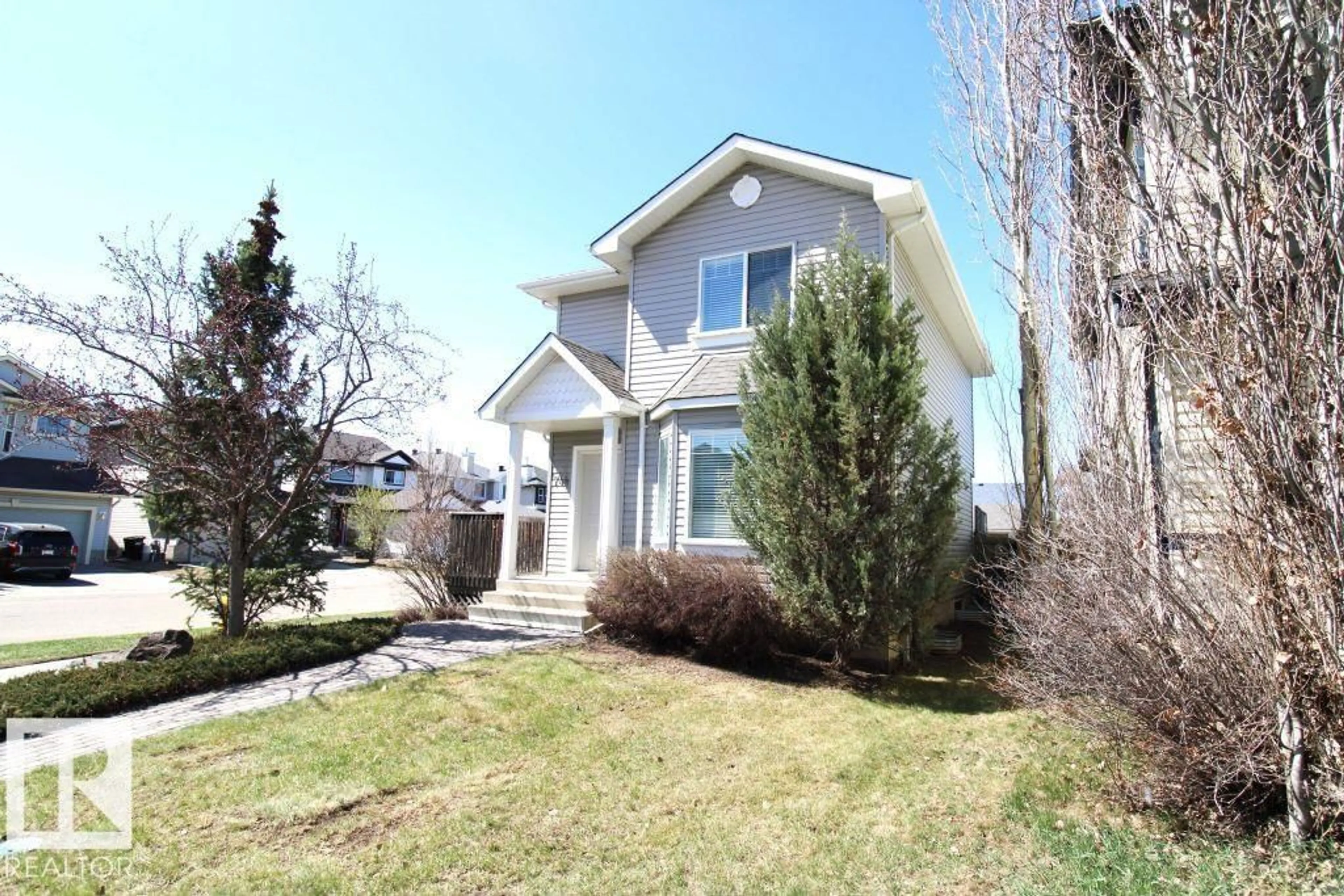 Home with vinyl exterior material, street for 744 88 ST, Edmonton Alberta T6X1C4