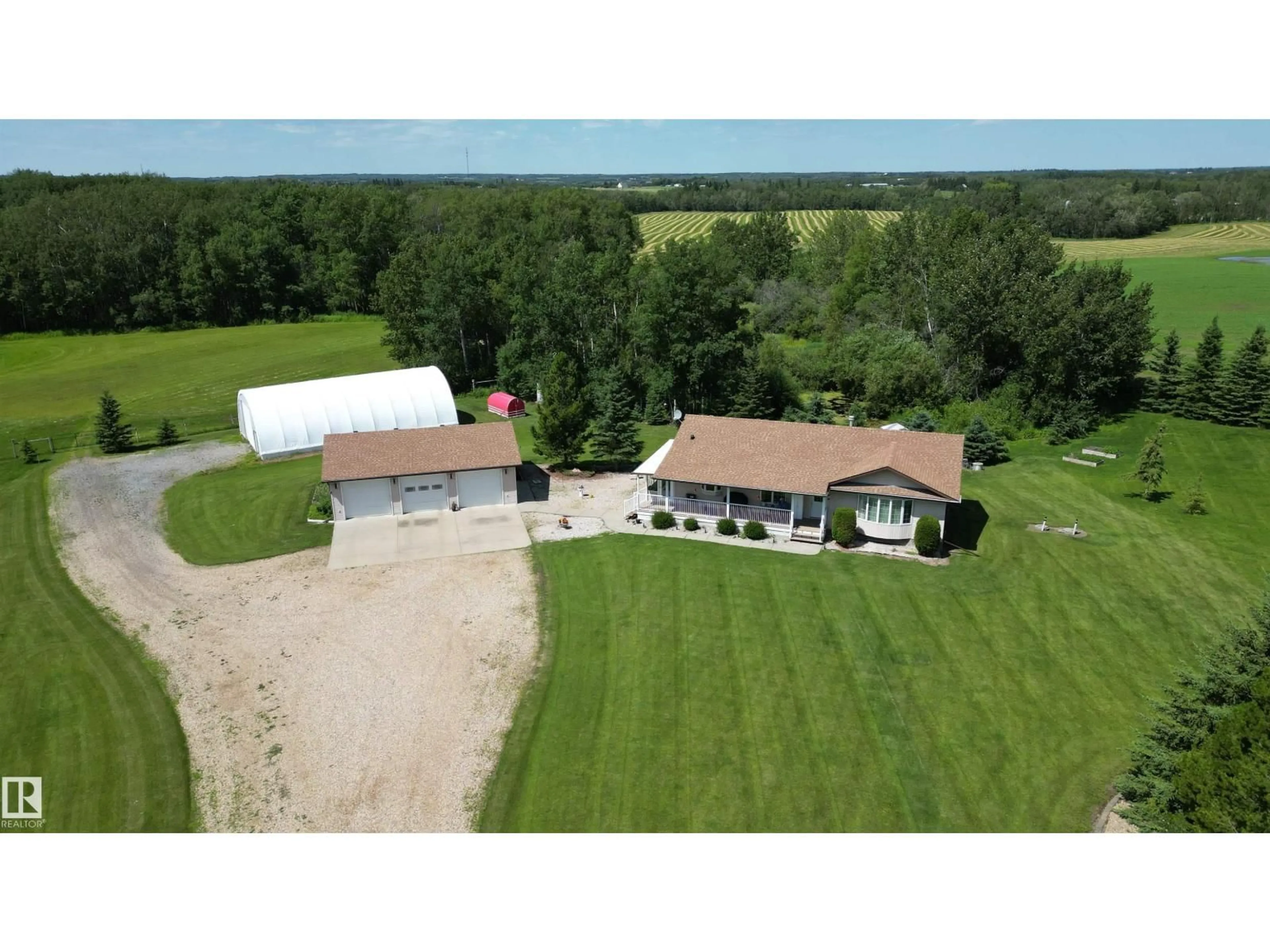 A pic from outside/outdoor area/front of a property/back of a property/a pic from drone, building for 53142 RGE ROAD 211, Rural Strathcona County Alberta T8C2C5