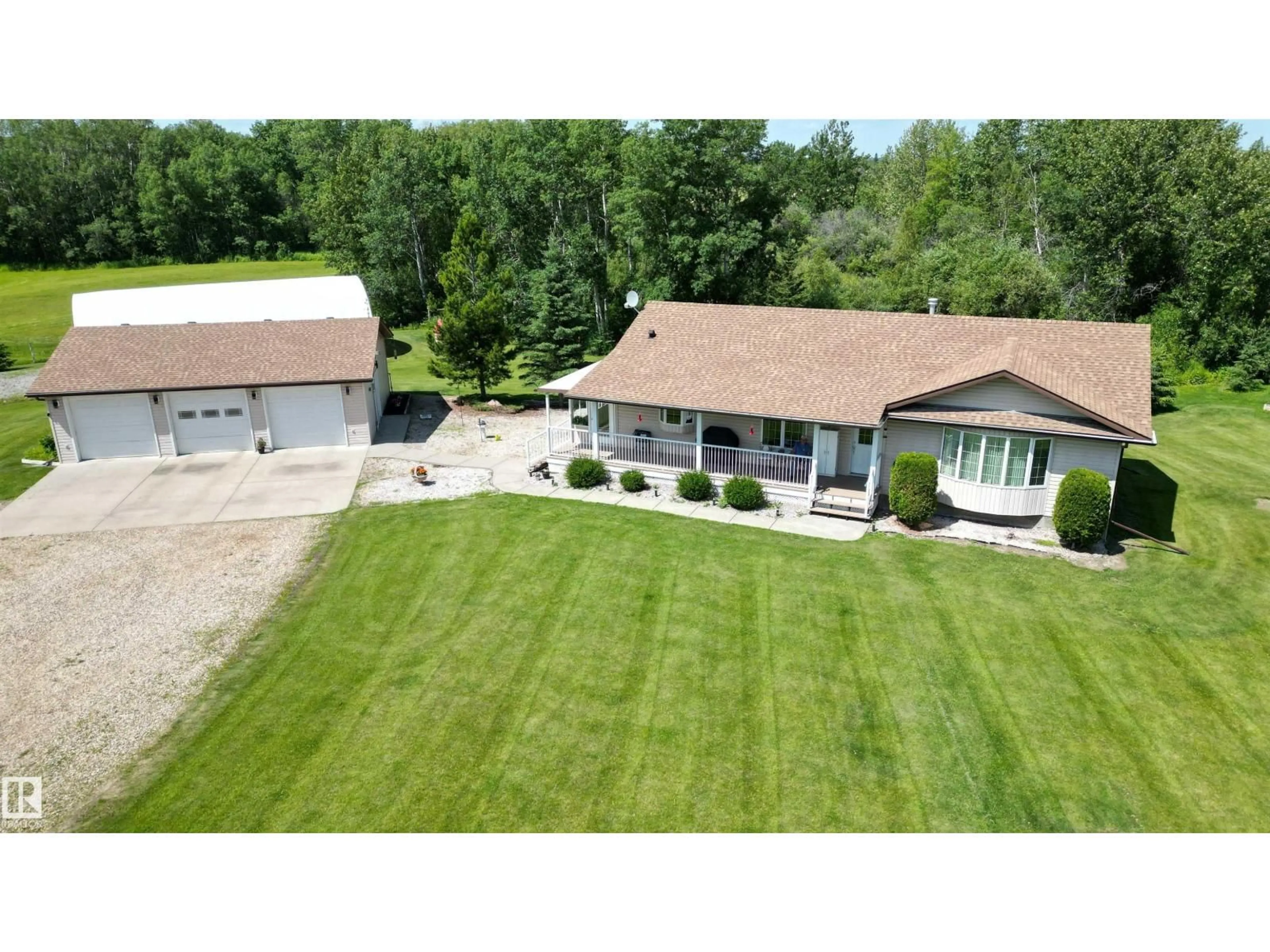 A pic from outside/outdoor area/front of a property/back of a property/a pic from drone, unknown for 53142 RGE ROAD 211, Rural Strathcona County Alberta T8C2C5