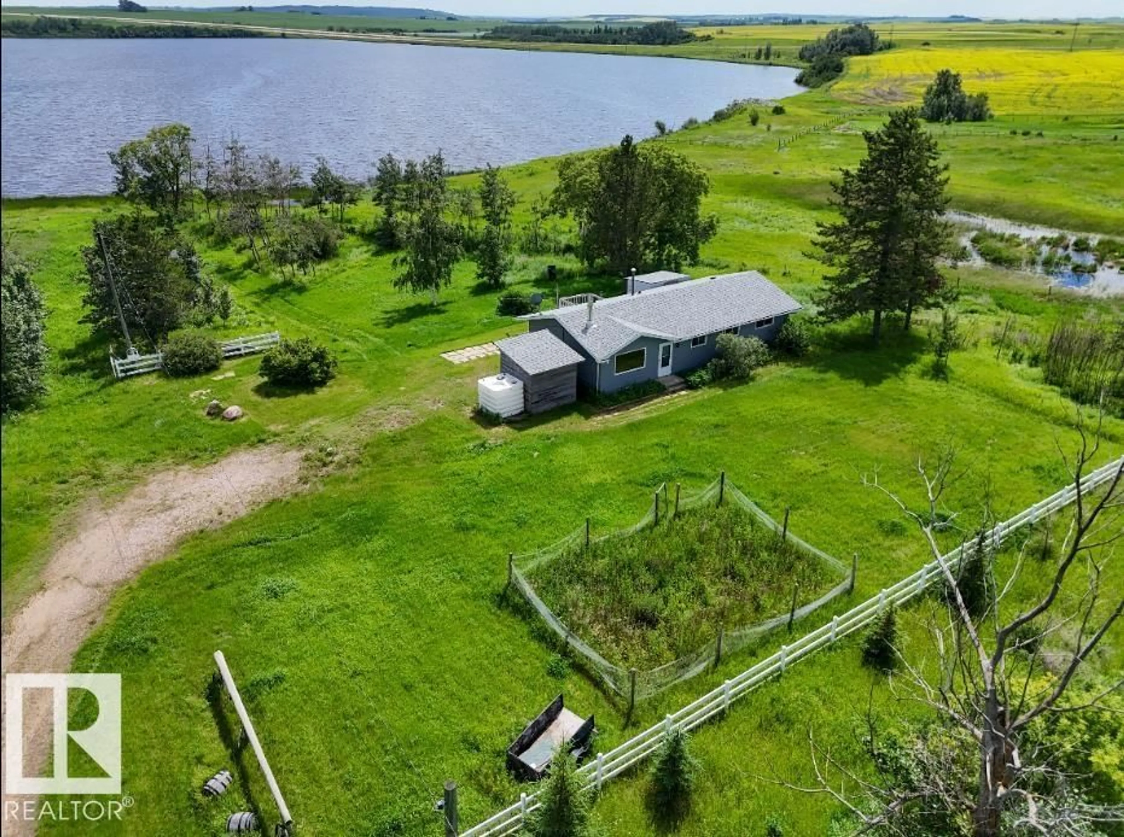 A pic from outside/outdoor area/front of a property/back of a property/a pic from drone, water/lake/river/ocean view for 4715 49 AV, Ranfurly Alberta T0B3T0