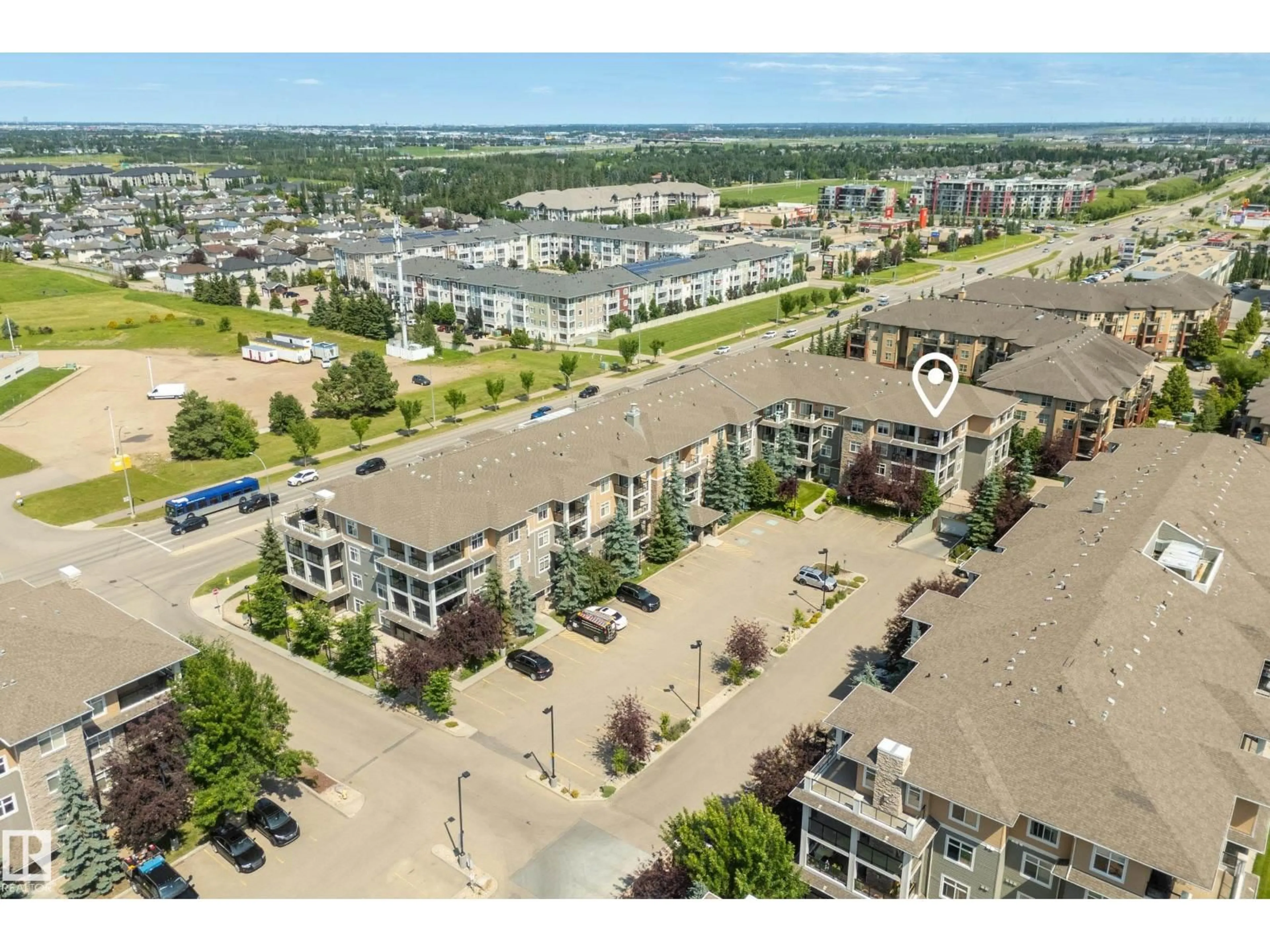 A pic from outside/outdoor area/front of a property/back of a property/a pic from drone, unknown for 11517 - 465 ELLERSLIE RD, Edmonton Alberta T6W2A9