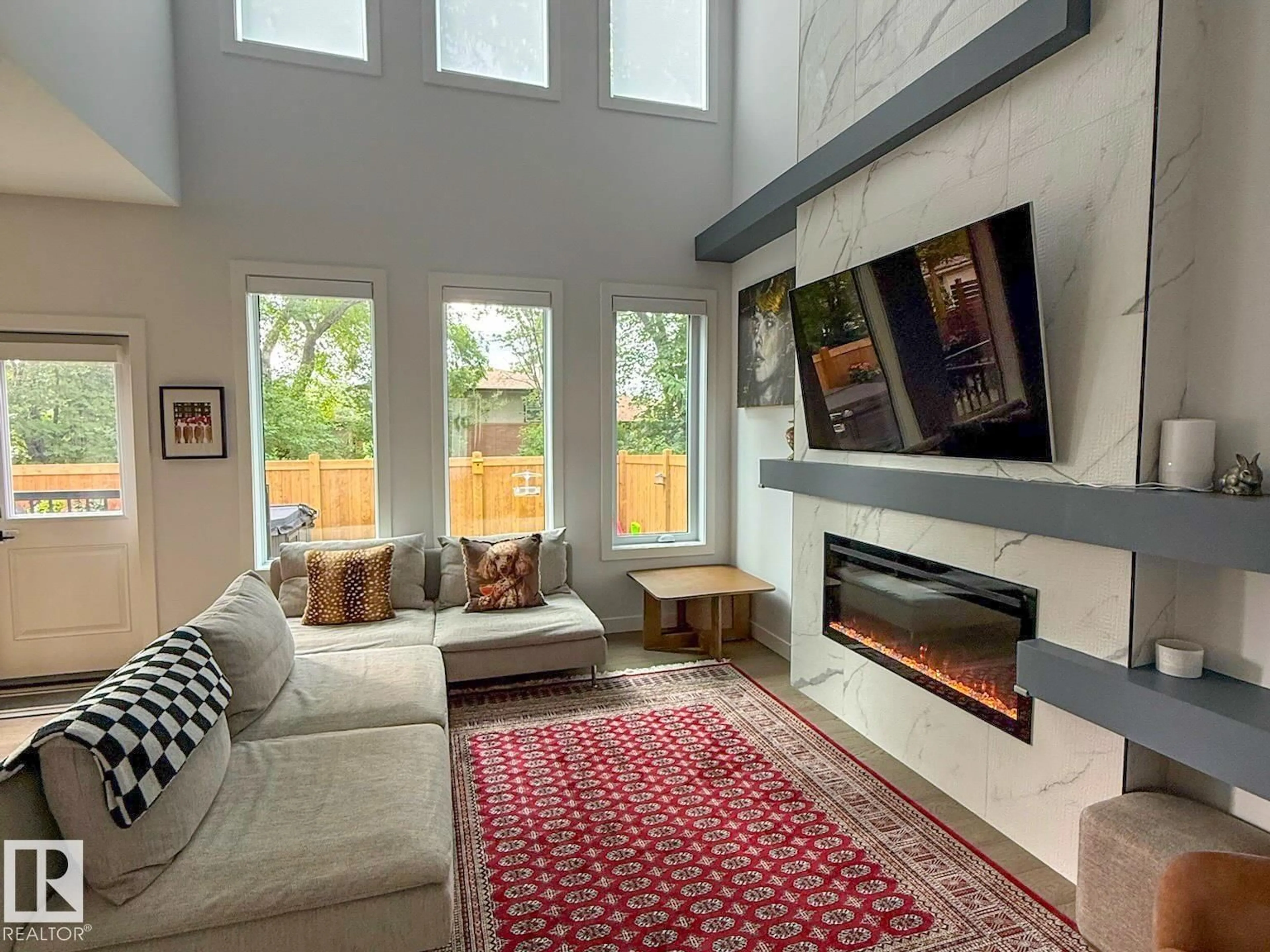Living room with furniture, unknown for 6005 107 ST, Edmonton Alberta T6H2X9