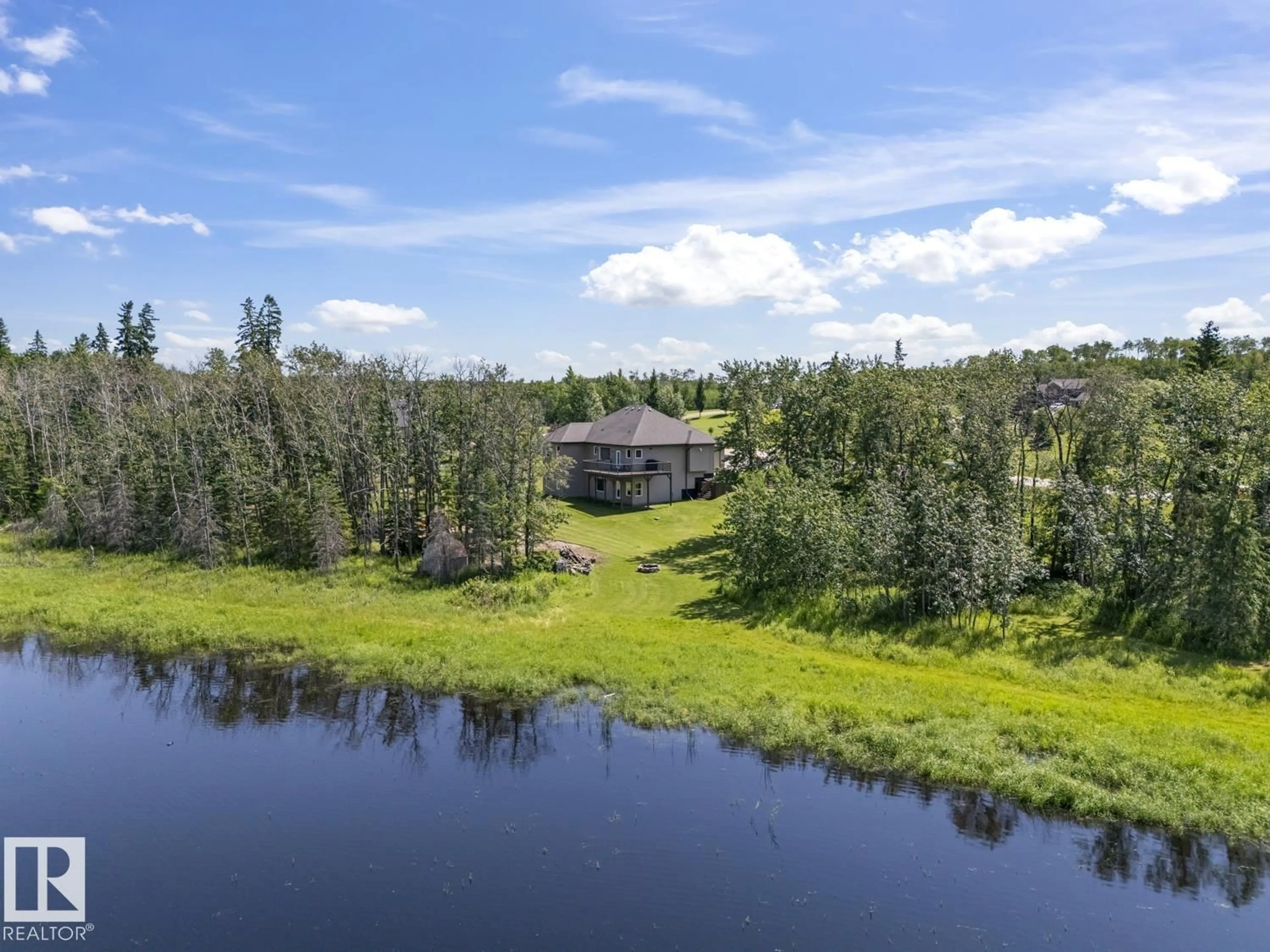 A pic from outside/outdoor area/front of a property/back of a property/a pic from drone, water/lake/river/ocean view for 6 - 61120 RR 465, Rural Bonnyville M.D. Alberta T9N2G9