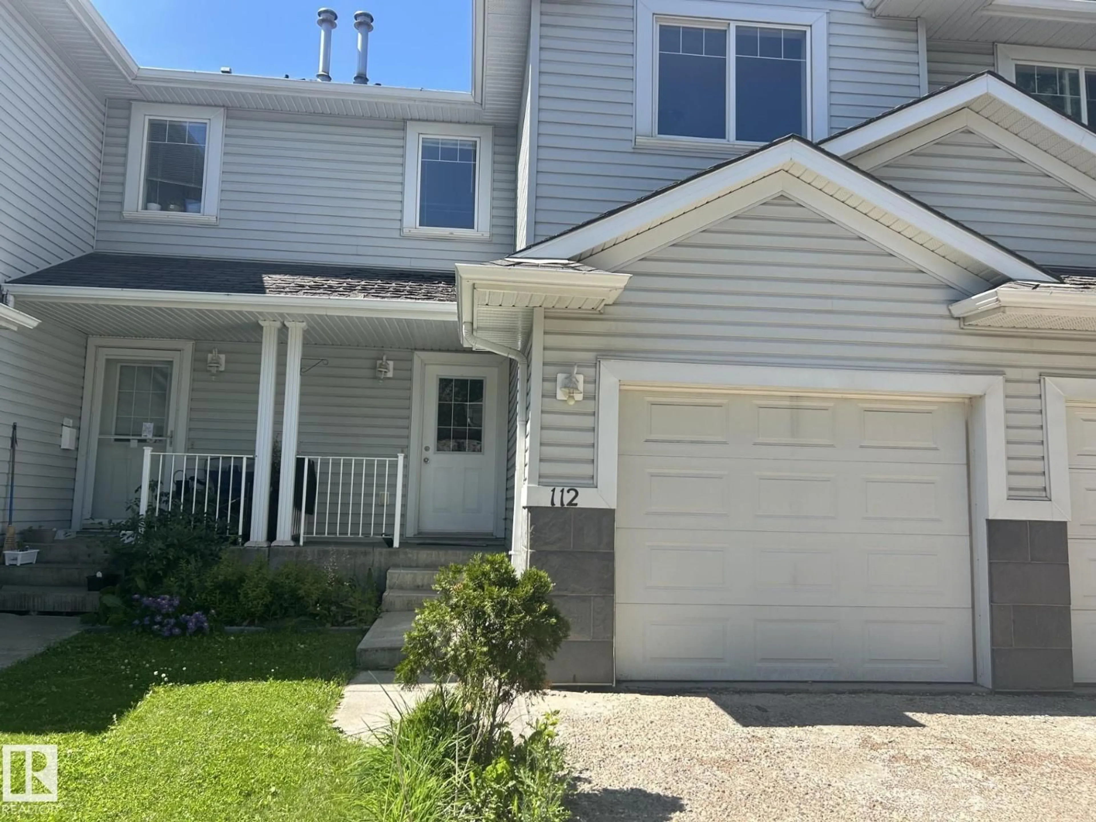 Home with vinyl exterior material, street for #112 - 4350 23 ST, Edmonton Alberta T6T1X8