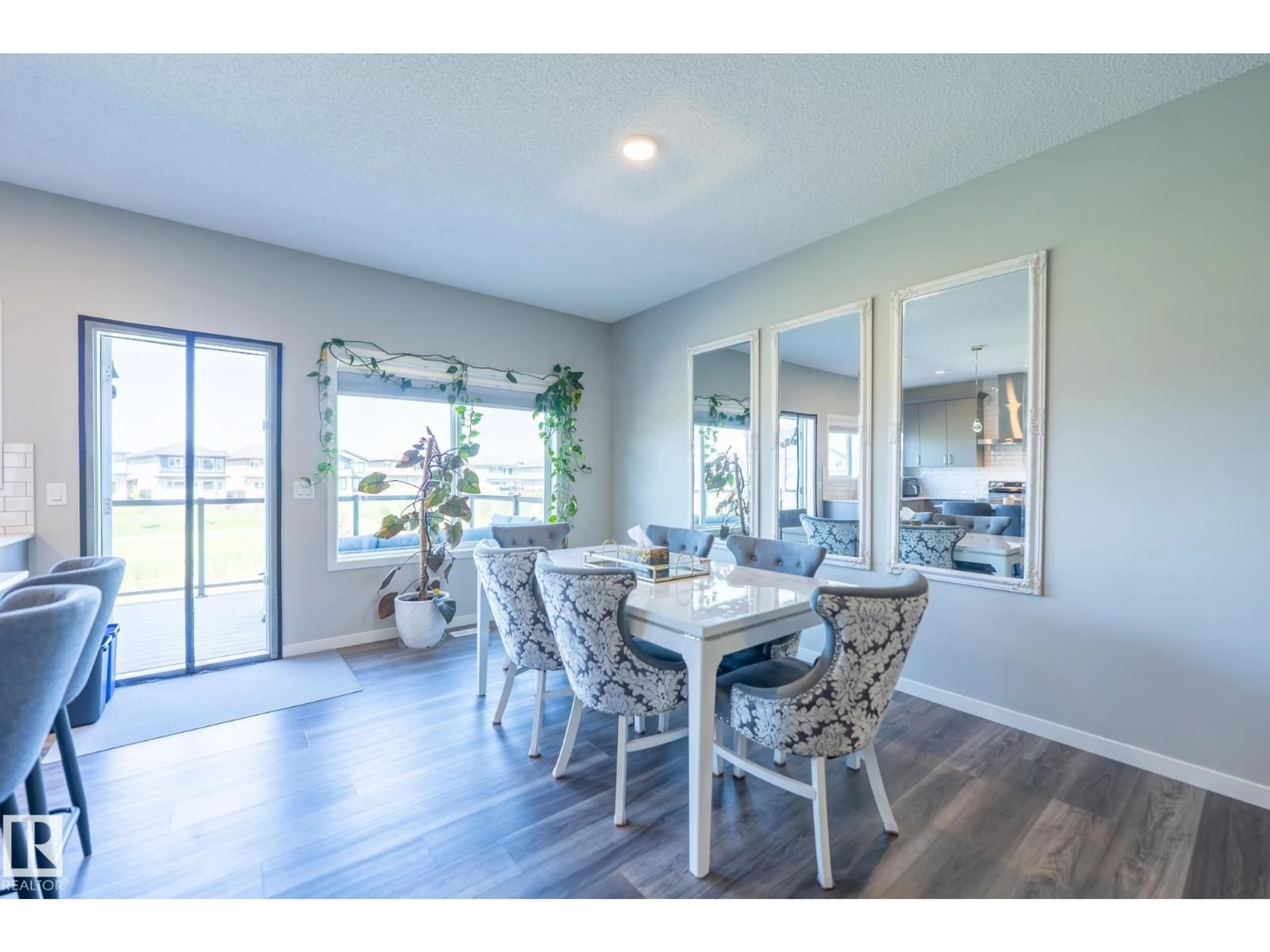 Dining room, wood/laminate floor for 5403 LARK LD, Edmonton Alberta T5S0S3