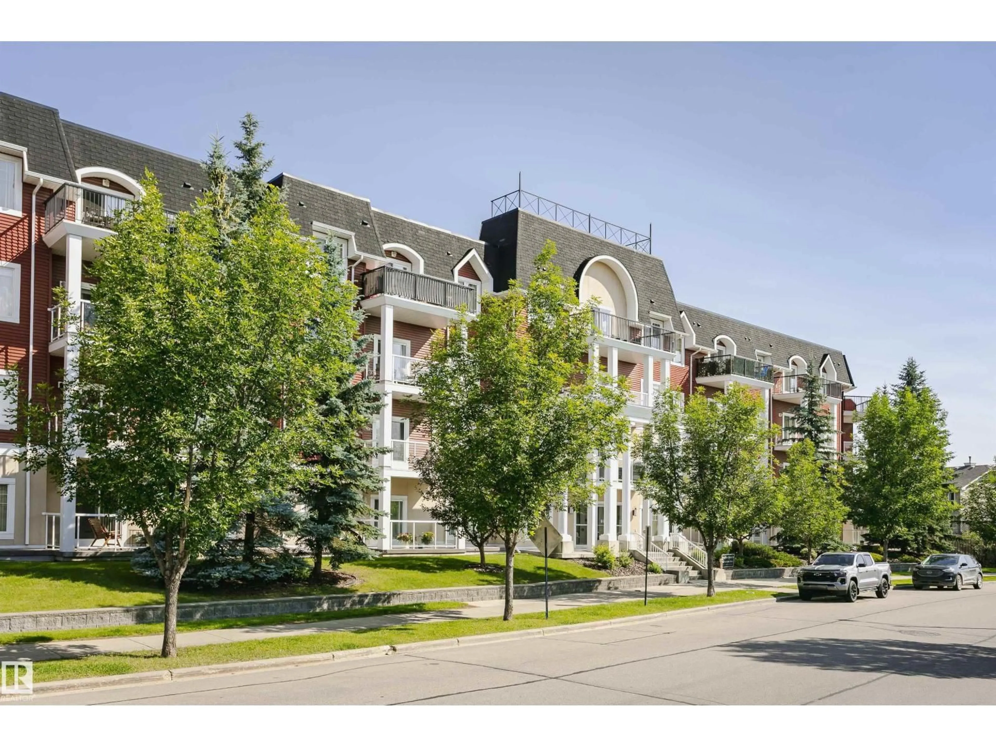 A pic from outside/outdoor area/front of a property/back of a property/a pic from drone, unknown for 226 - 205 MACEWAN RD, Edmonton Alberta T6W0C5