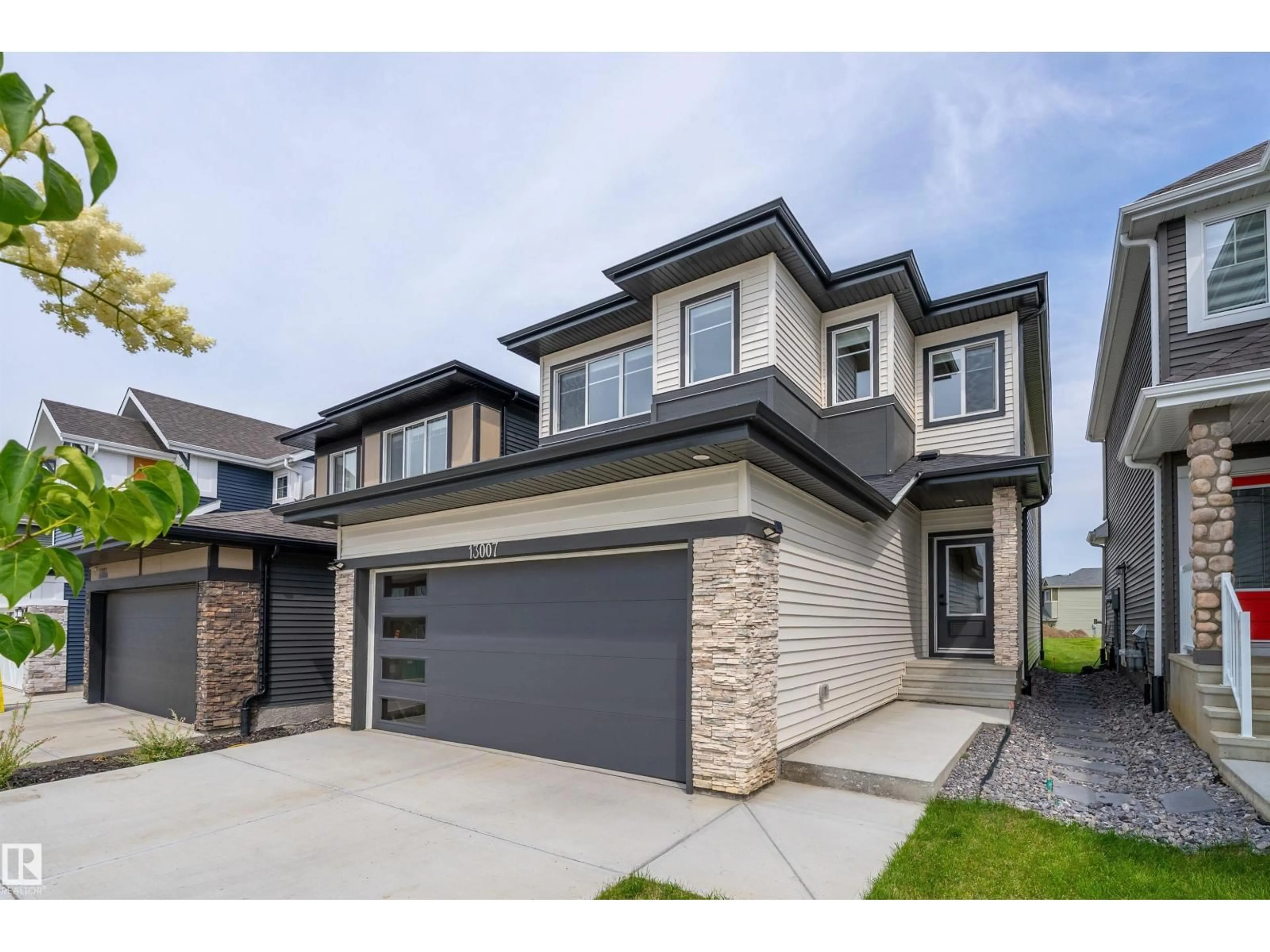 Home with brick exterior material, street for NW - 13007 213 ST, Edmonton Alberta T5S0T7