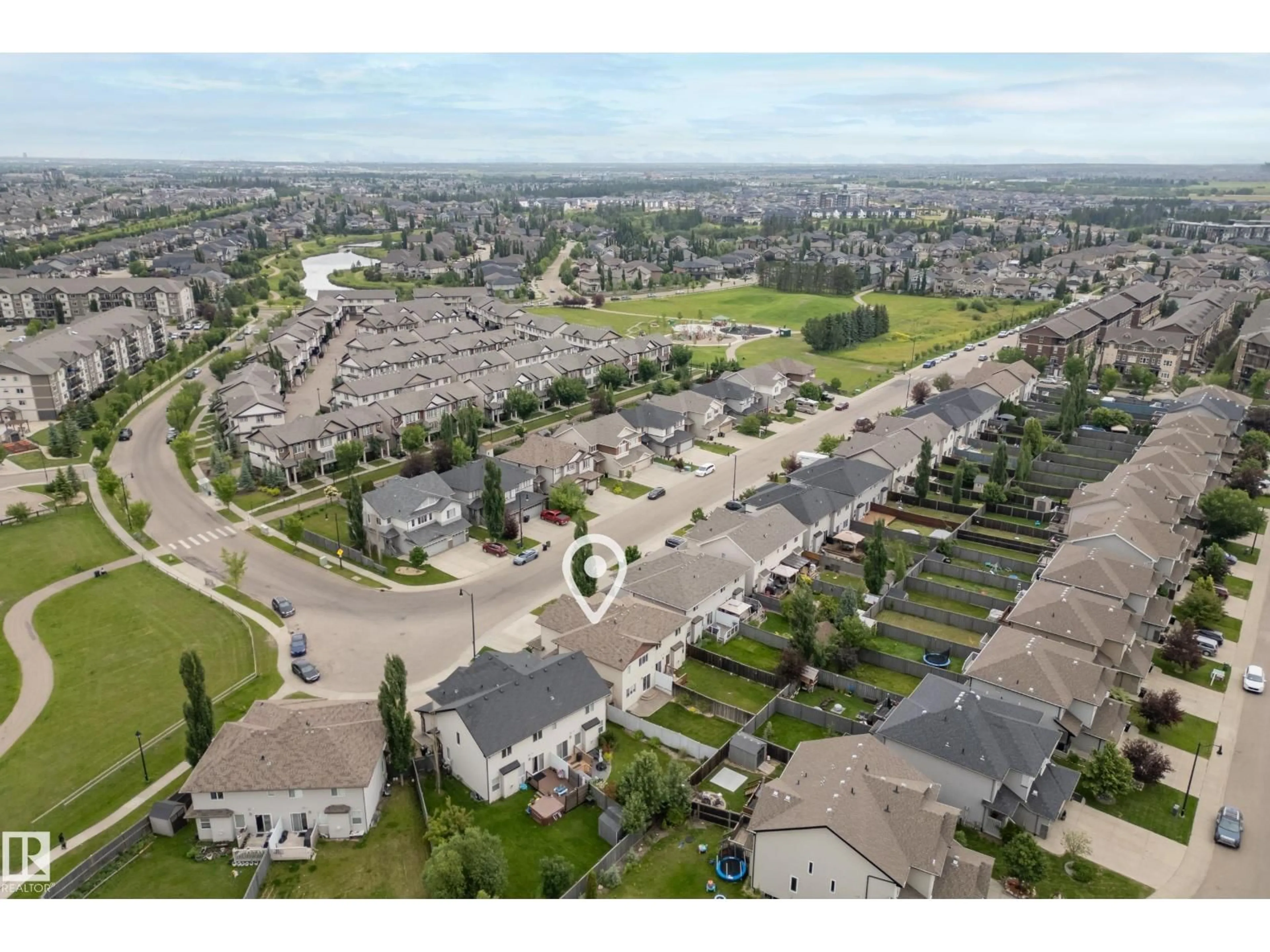 A pic from outside/outdoor area/front of a property/back of a property/a pic from drone, street for 1715 CUNNINGHAM WY, Edmonton Alberta T6W0W4