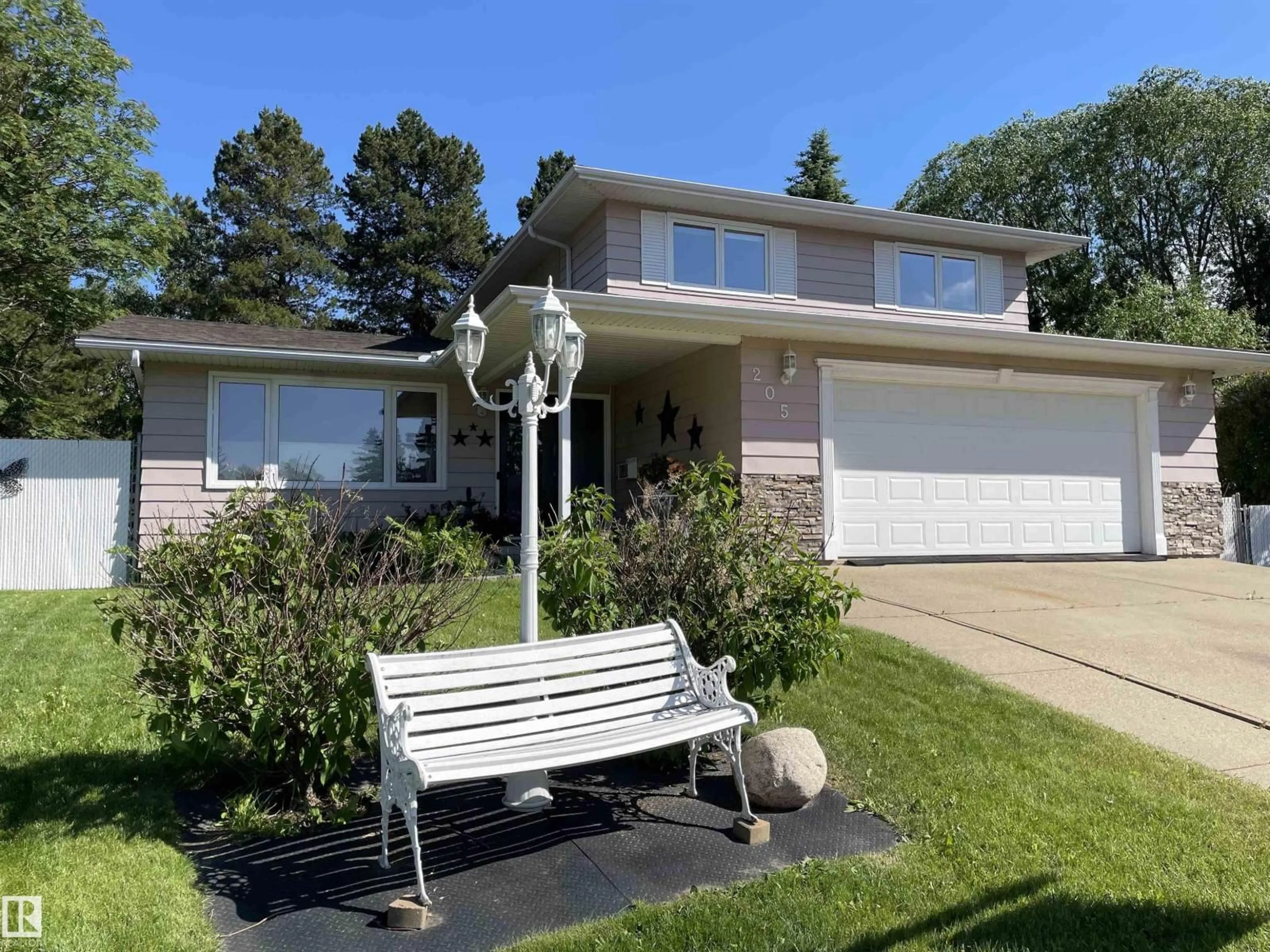 Home with vinyl exterior material, street for 205 MANOR CO, Sherwood Park Alberta T8A0S8