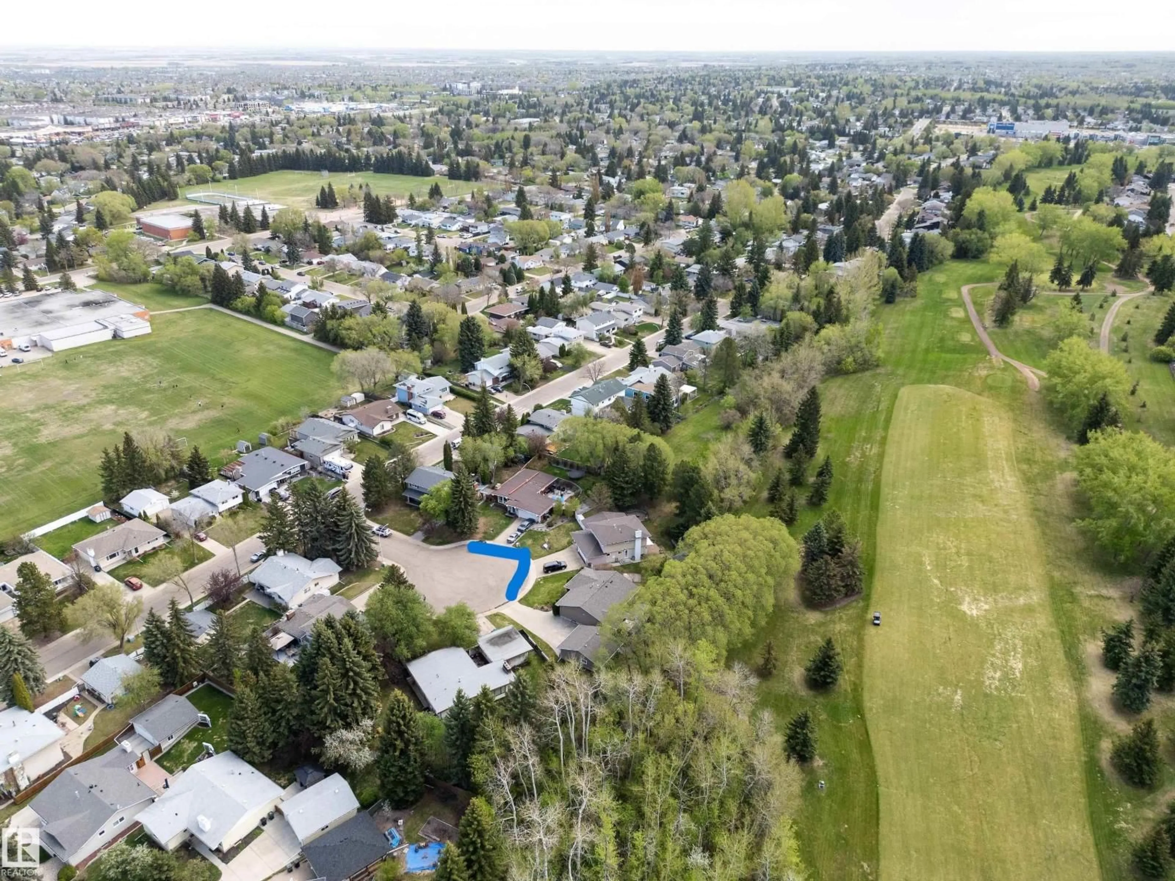A pic from outside/outdoor area/front of a property/back of a property/a pic from drone, mountain view for 205 MANOR CO, Sherwood Park Alberta T8A0S8