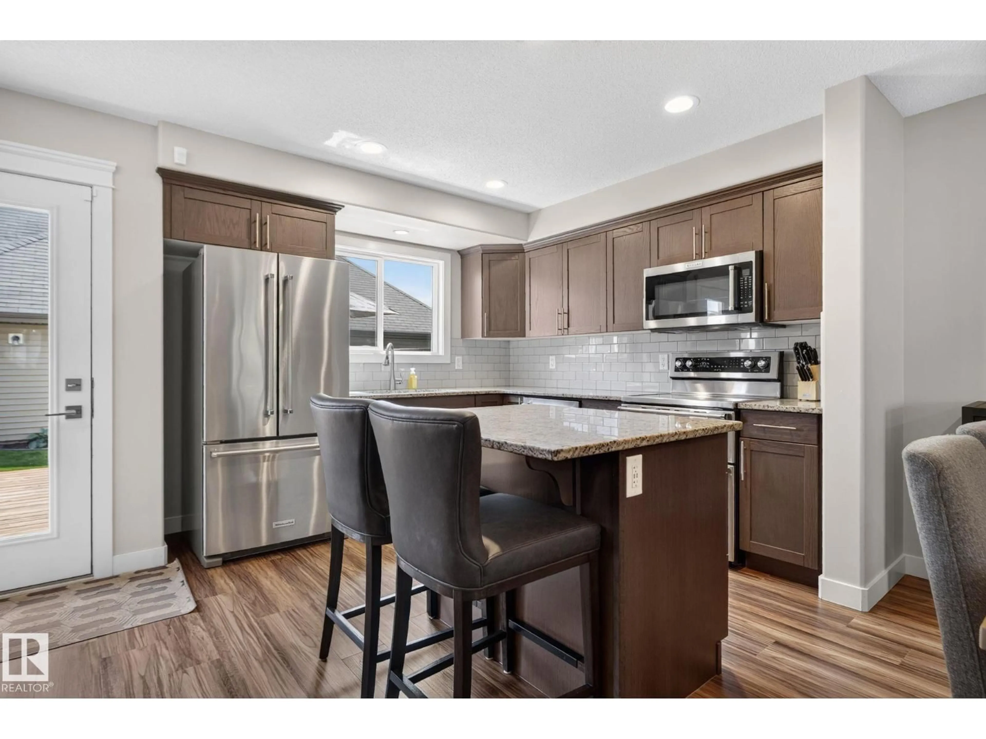 Open concept kitchen, unknown for 319 DESROCHERS BV, Edmonton Alberta T6W3J1