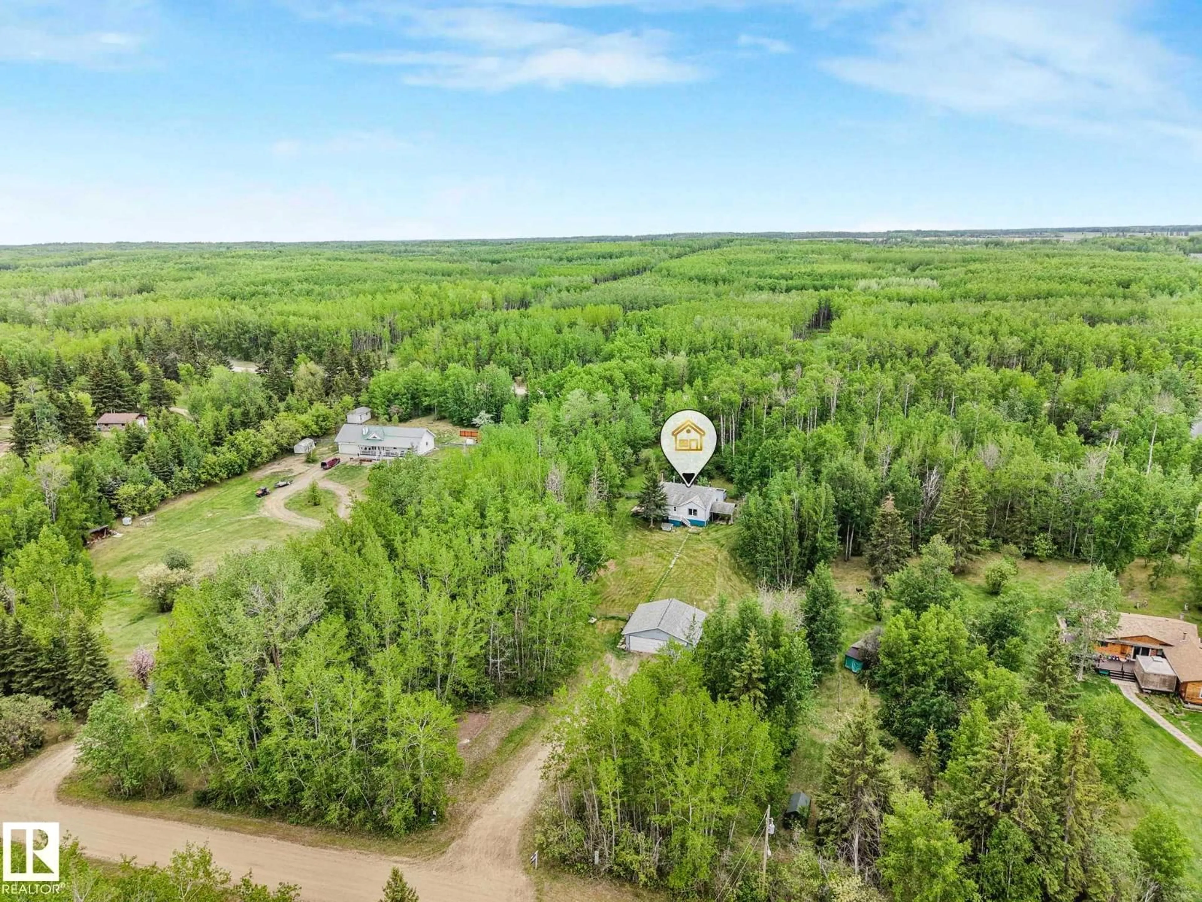 A pic from outside/outdoor area/front of a property/back of a property/a pic from drone, forest/trees view for 2120 TWP ROAD 565, Rural Lac Ste. Anne County Alberta T0E1V0