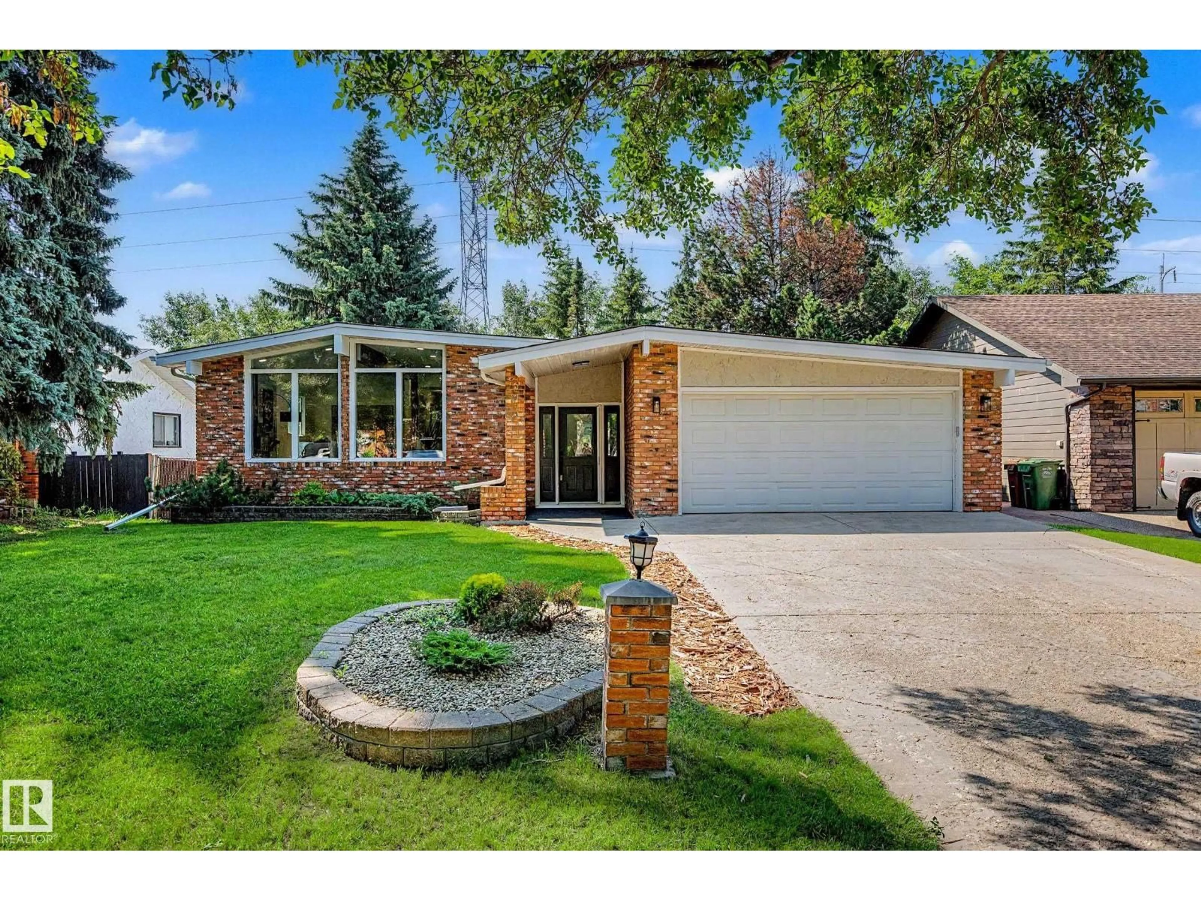 Home with brick exterior material, street for 102 GOODRIDGE DR, St. Albert Alberta T8N2B2