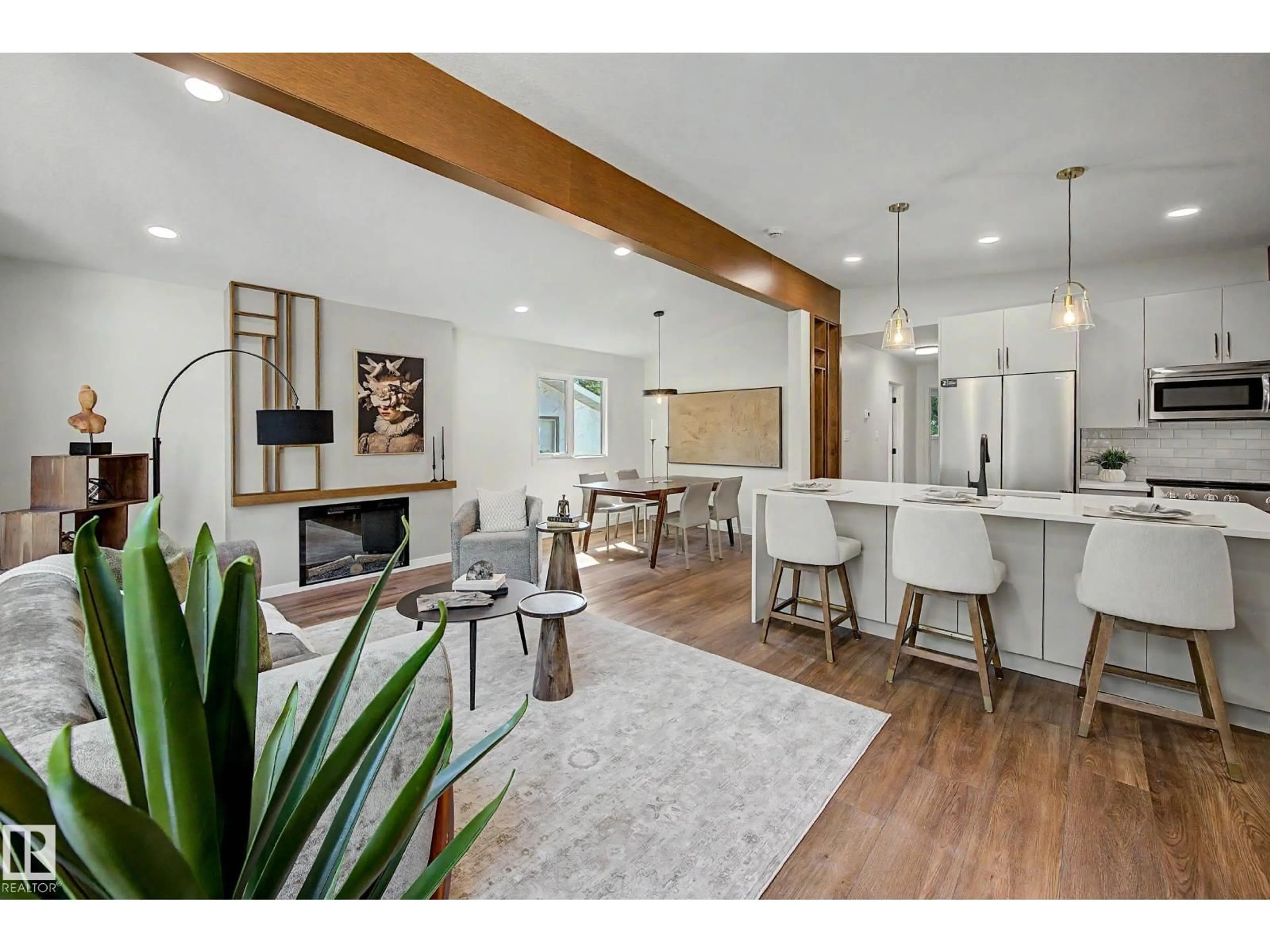Open concept kitchen, wood/laminate floor for 102 GOODRIDGE DR, St. Albert Alberta T8N2B2